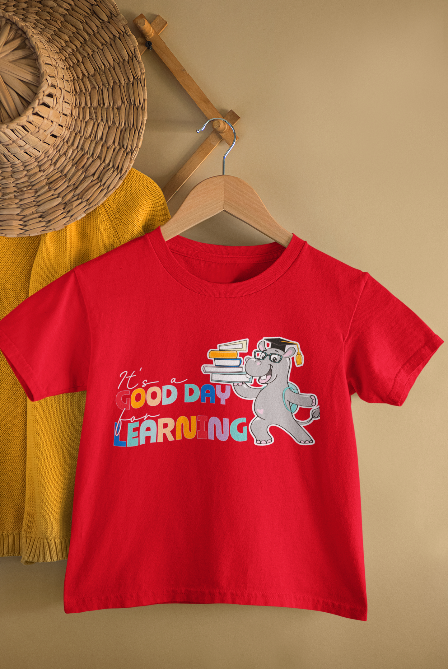 a child's t - shirt that says good day learning