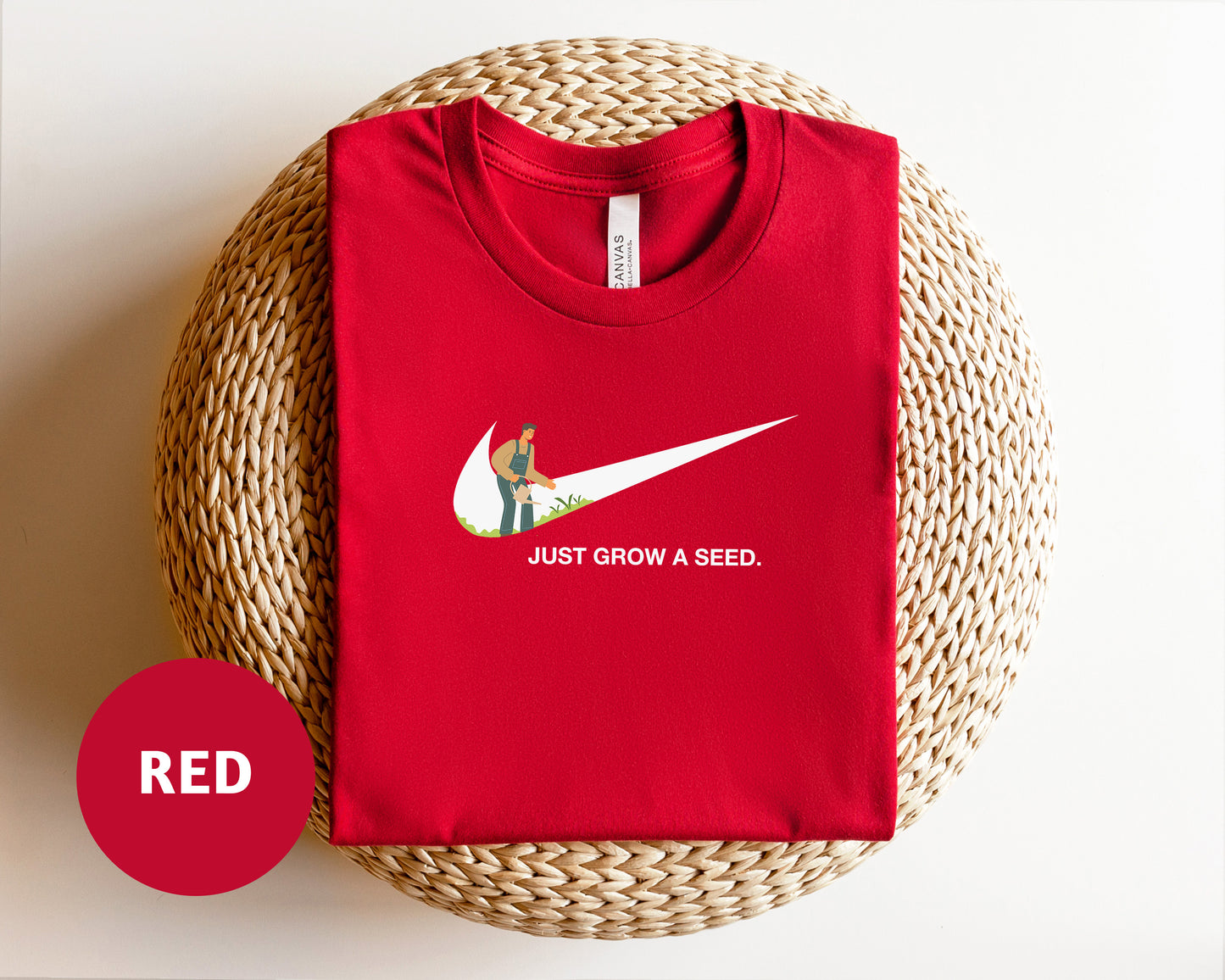 a red shirt with a white nike logo on it