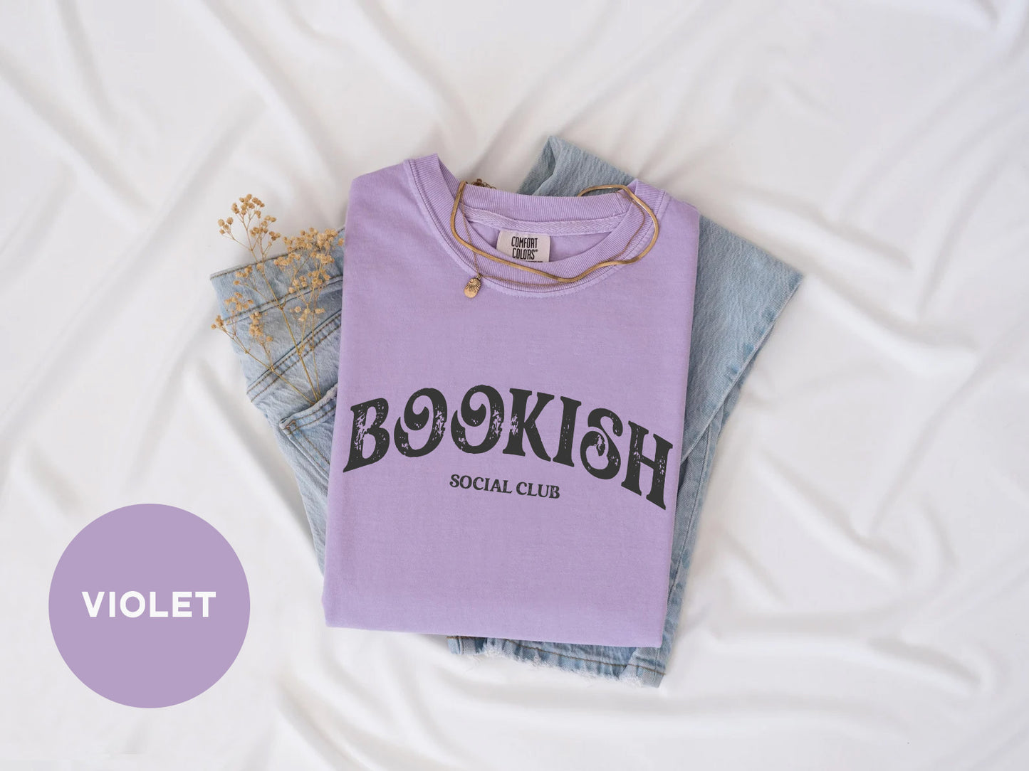 a purple shirt that says bookish on it