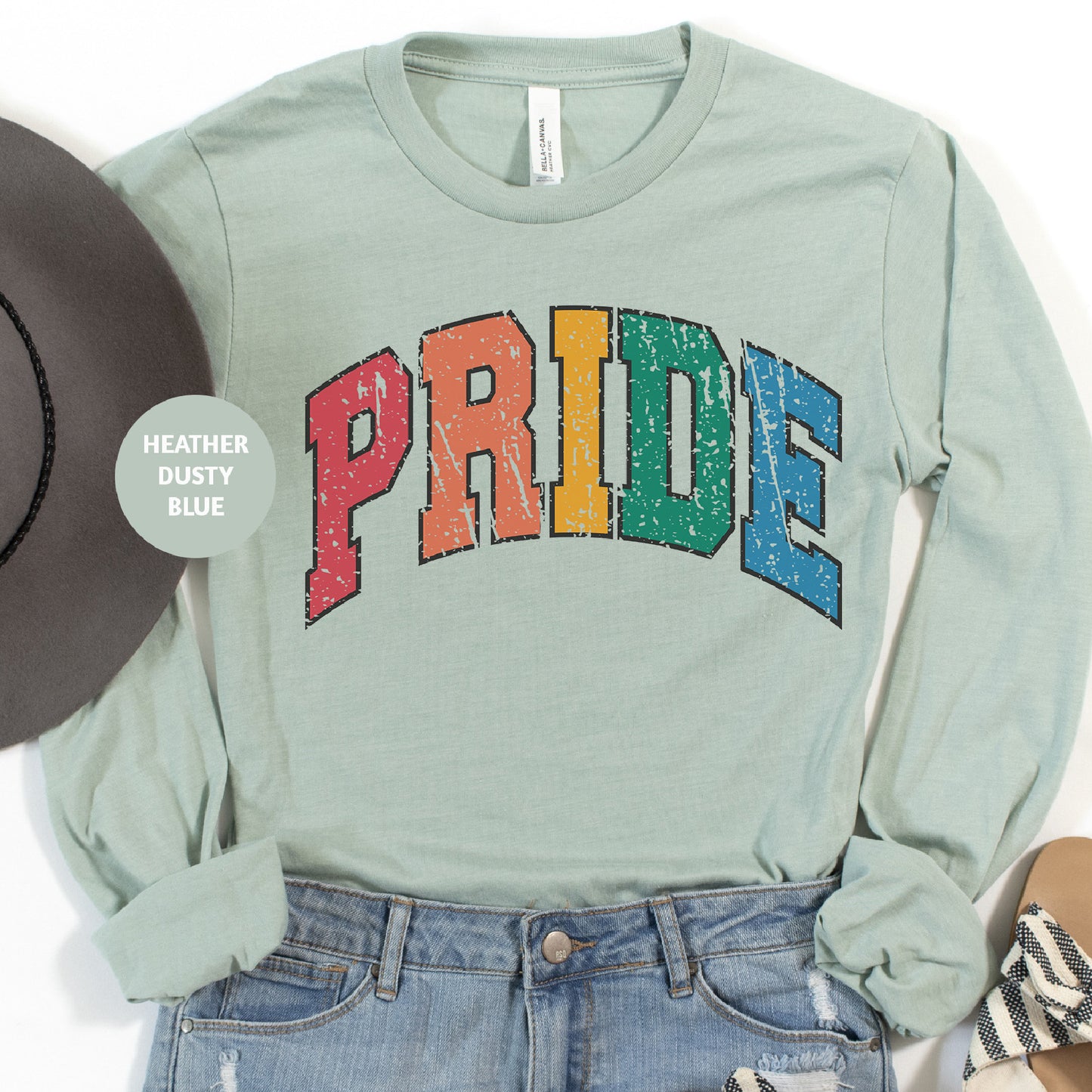a green shirt with the word pride on it