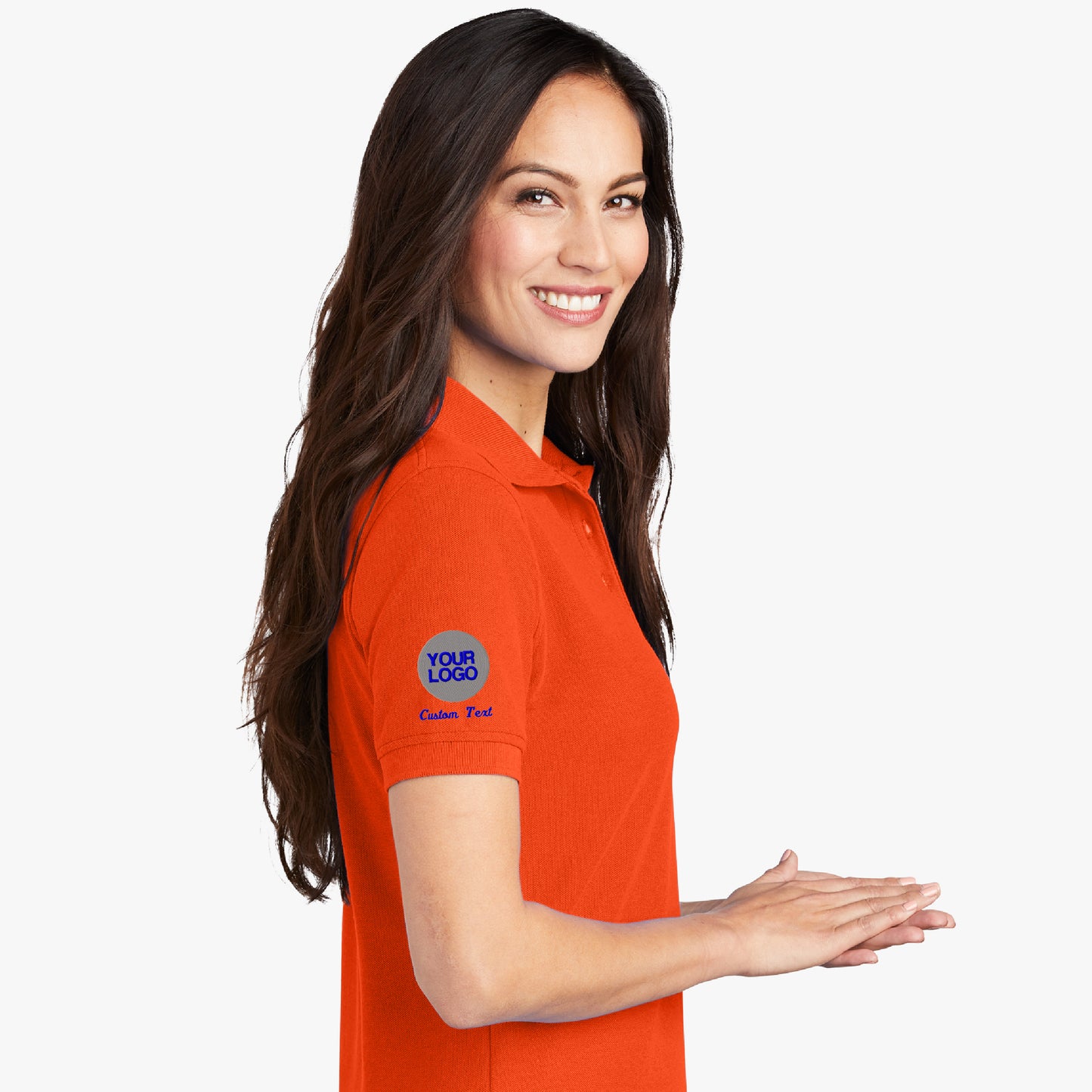 a woman in an orange shirt is smiling