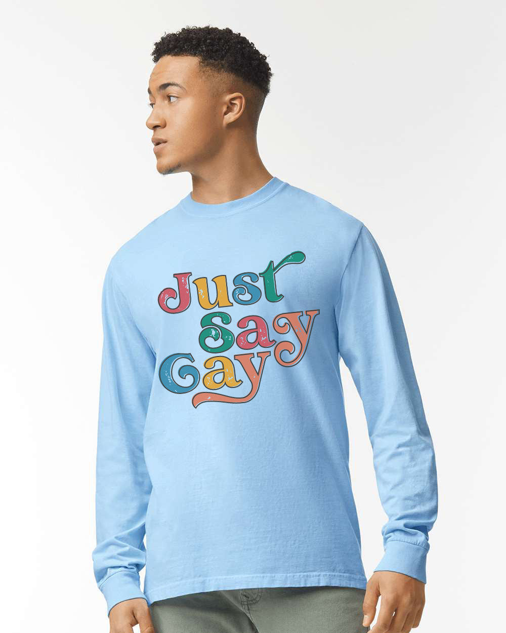 a man wearing a blue shirt that says just gay