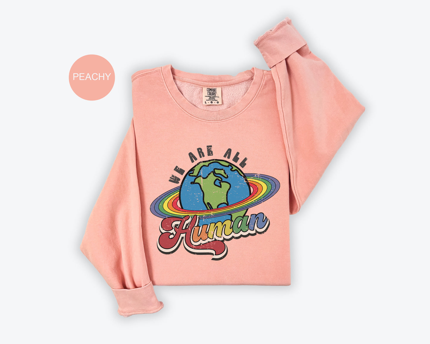 a pink shirt with a picture of the earth on it