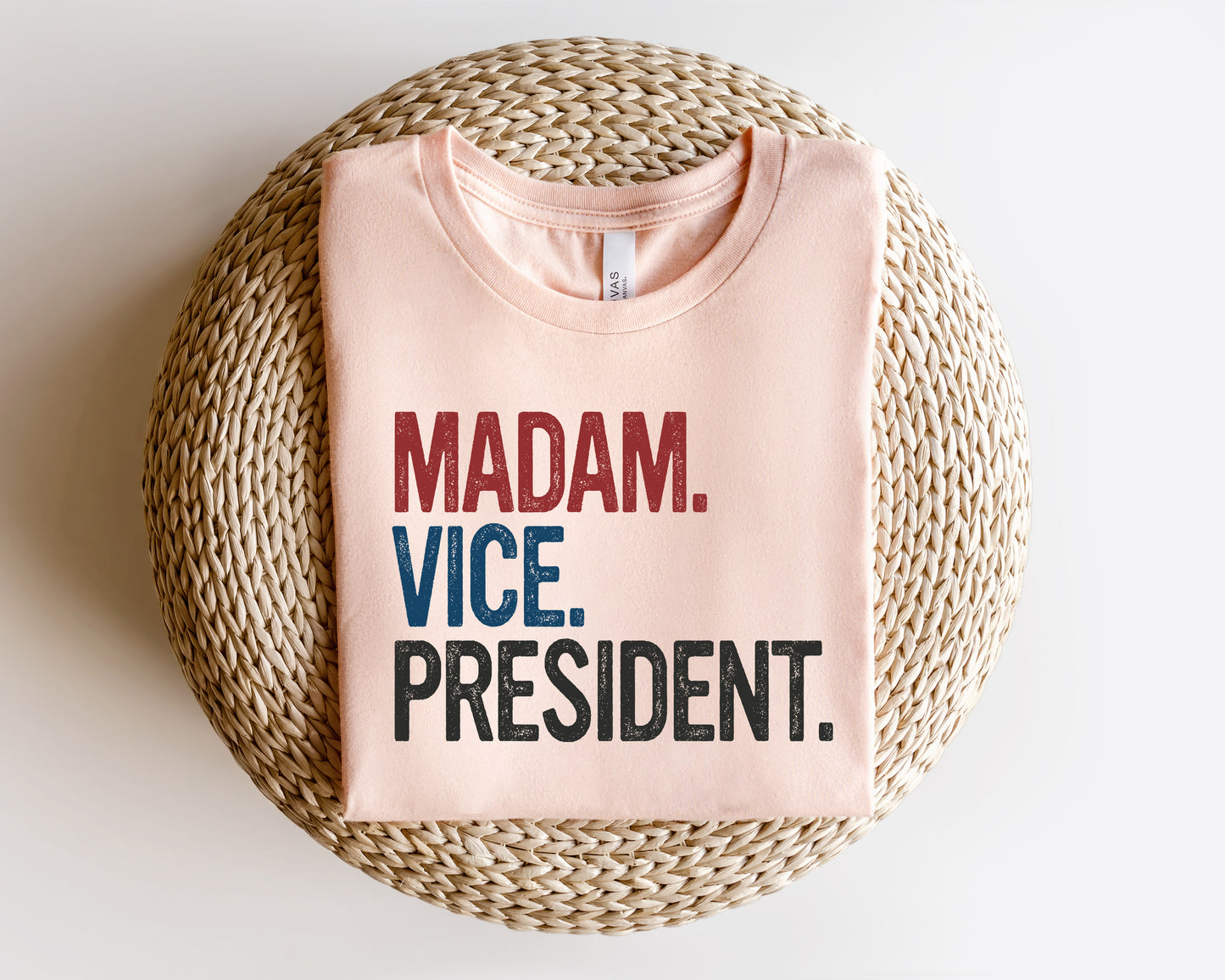 a pink shirt that says madam vice president