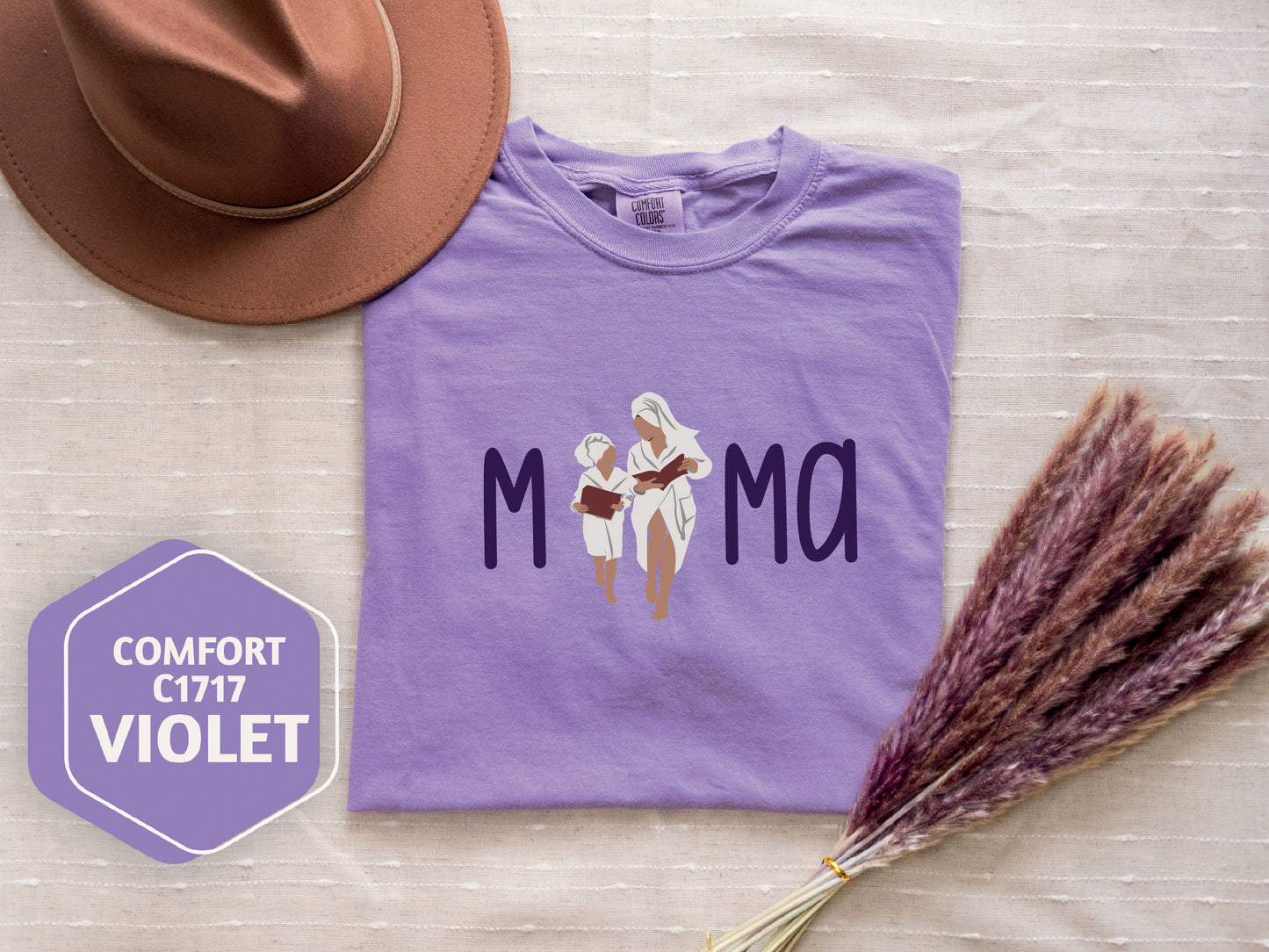 a purple shirt with a picture of two women on it