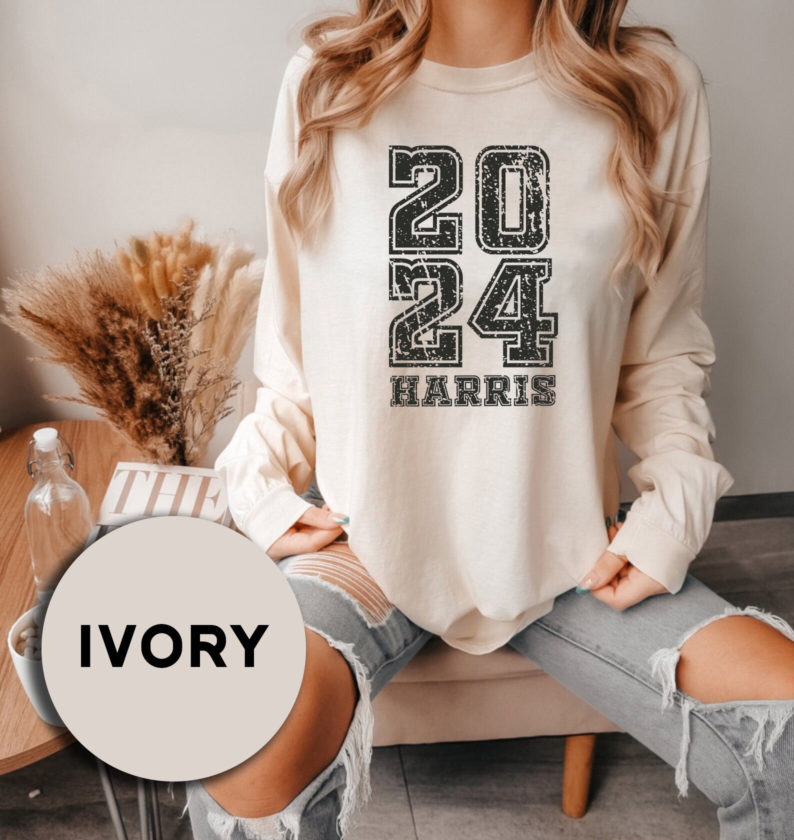 a woman sitting on a couch with her legs crossed