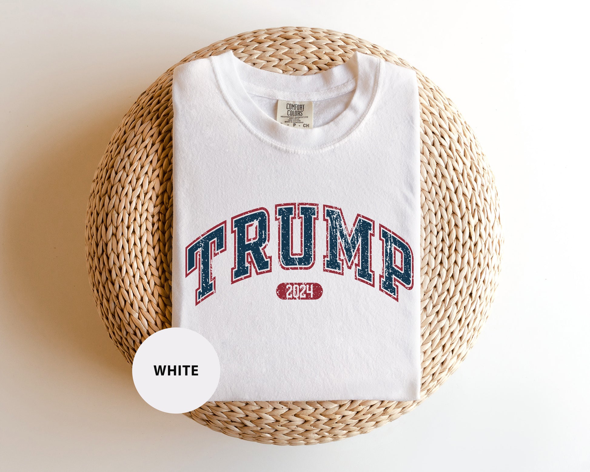 a white shirt with the word trump printed on it