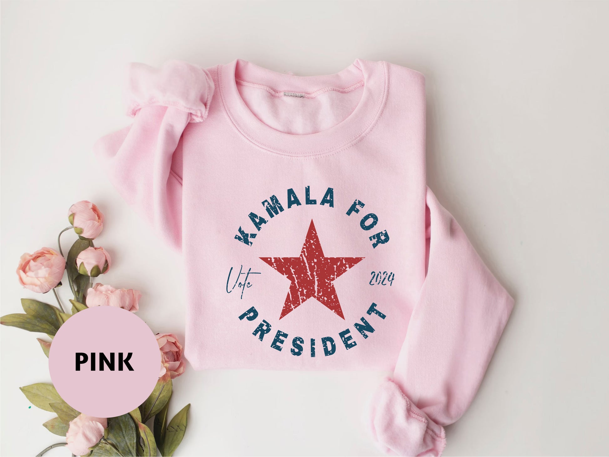 a pink sweater with a star on it