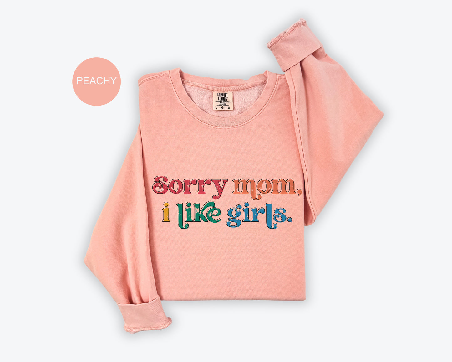 a pink shirt that says sorry mom i like girls