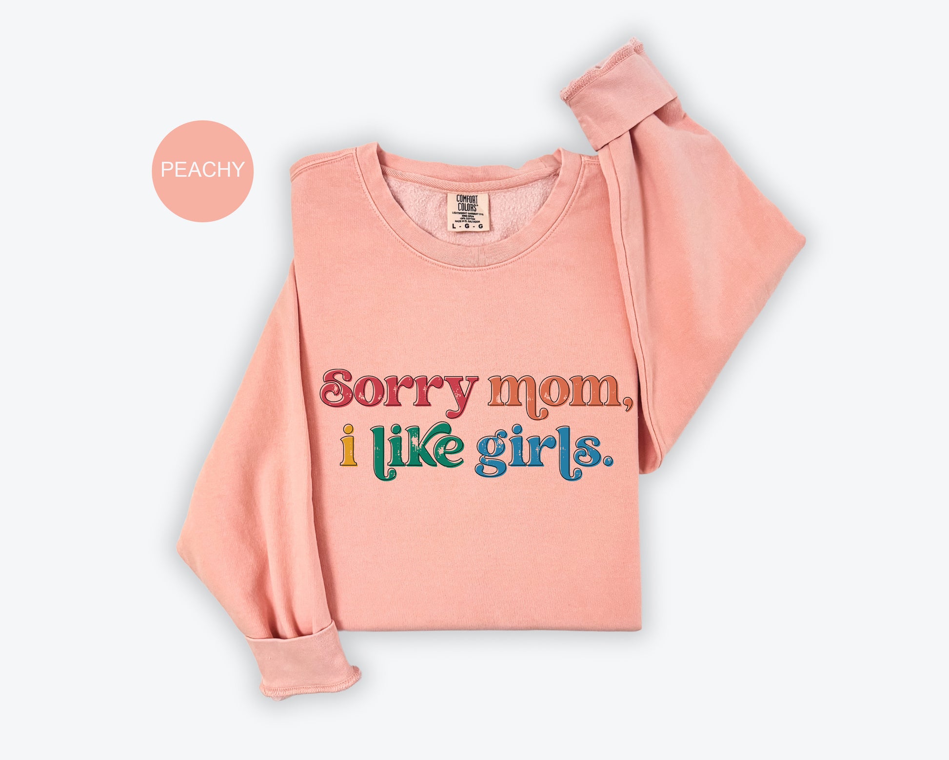 a pink shirt that says sorry mom i like girls