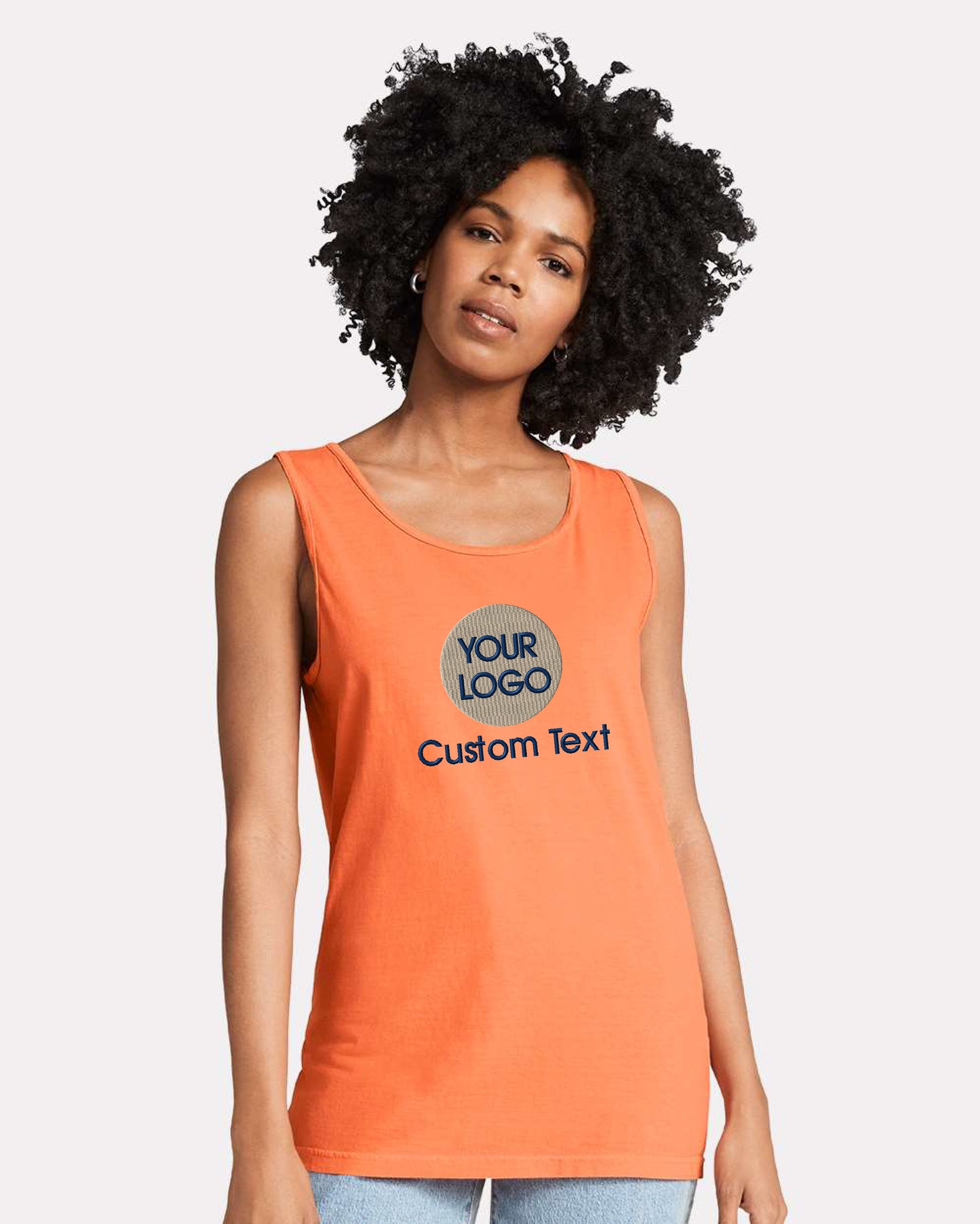 a woman wearing an orange tank top that says your logo is custom text