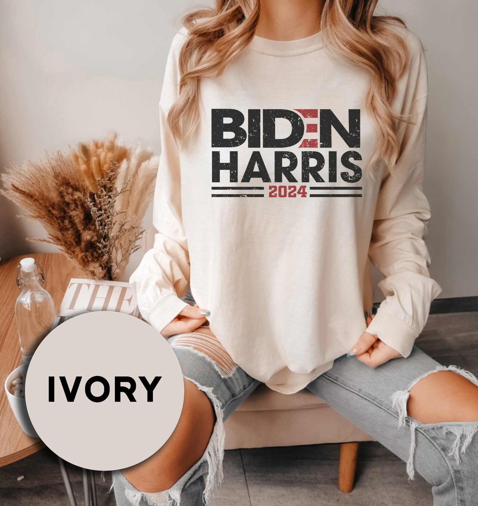 a woman sitting on a couch with her legs crossed