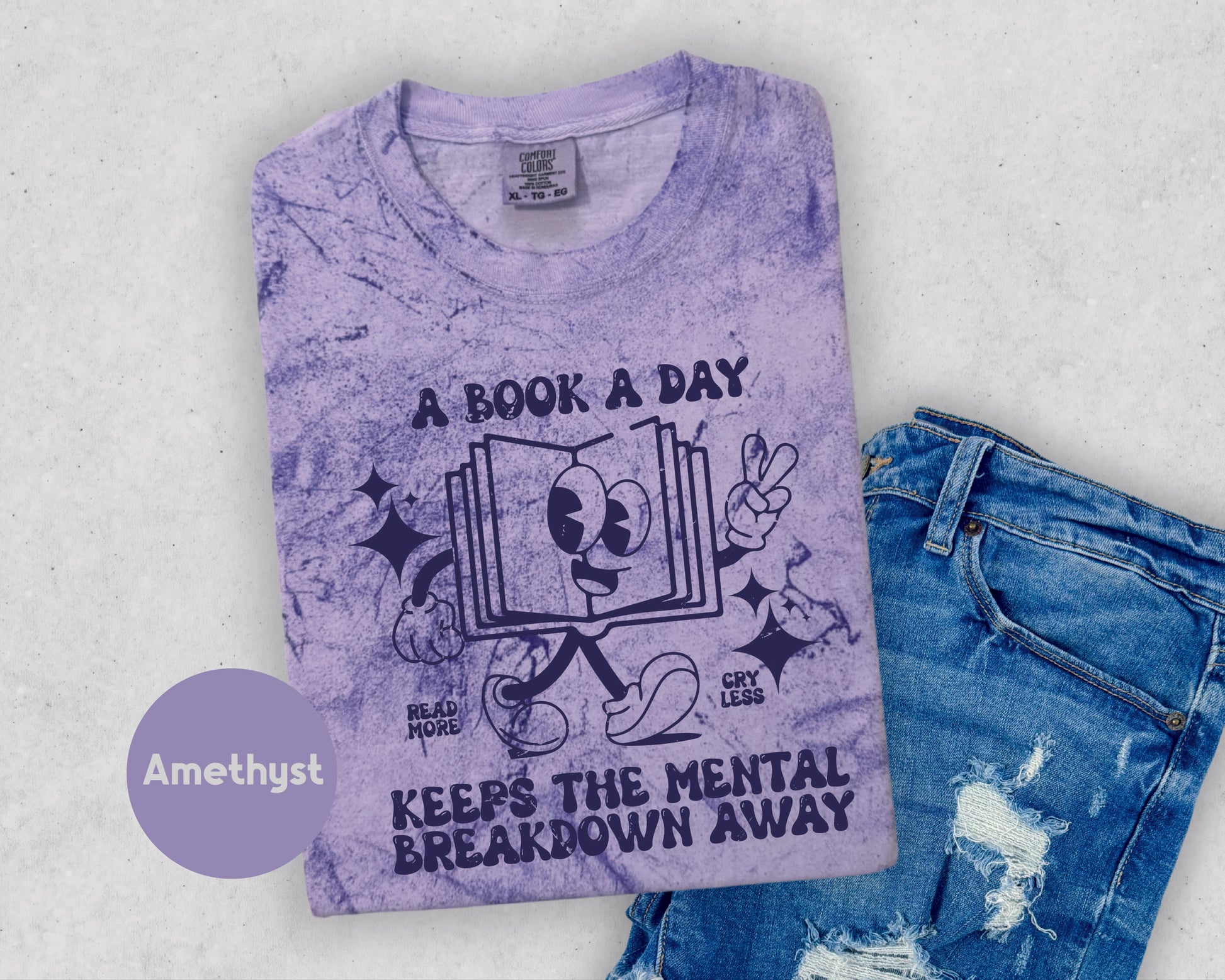 a t - shirt that says, a book a day keeps the mental breakdown