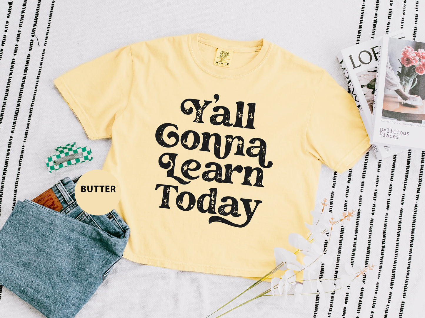 a yellow shirt that says y'all gona learn today