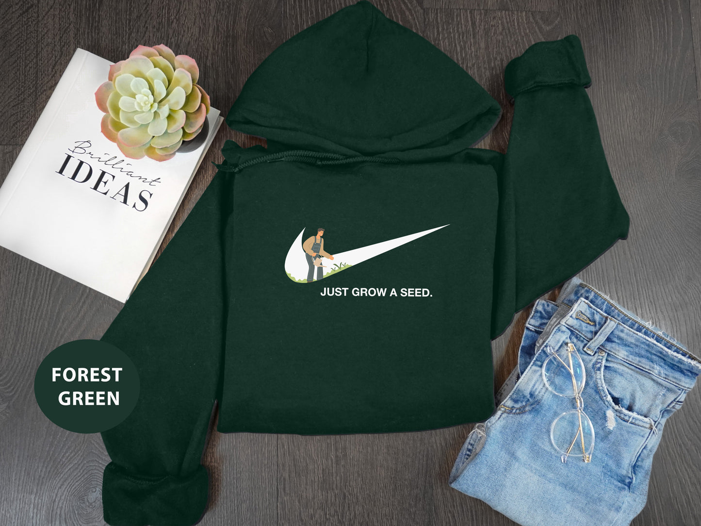 a green hoodie with the words just grow a seed on it