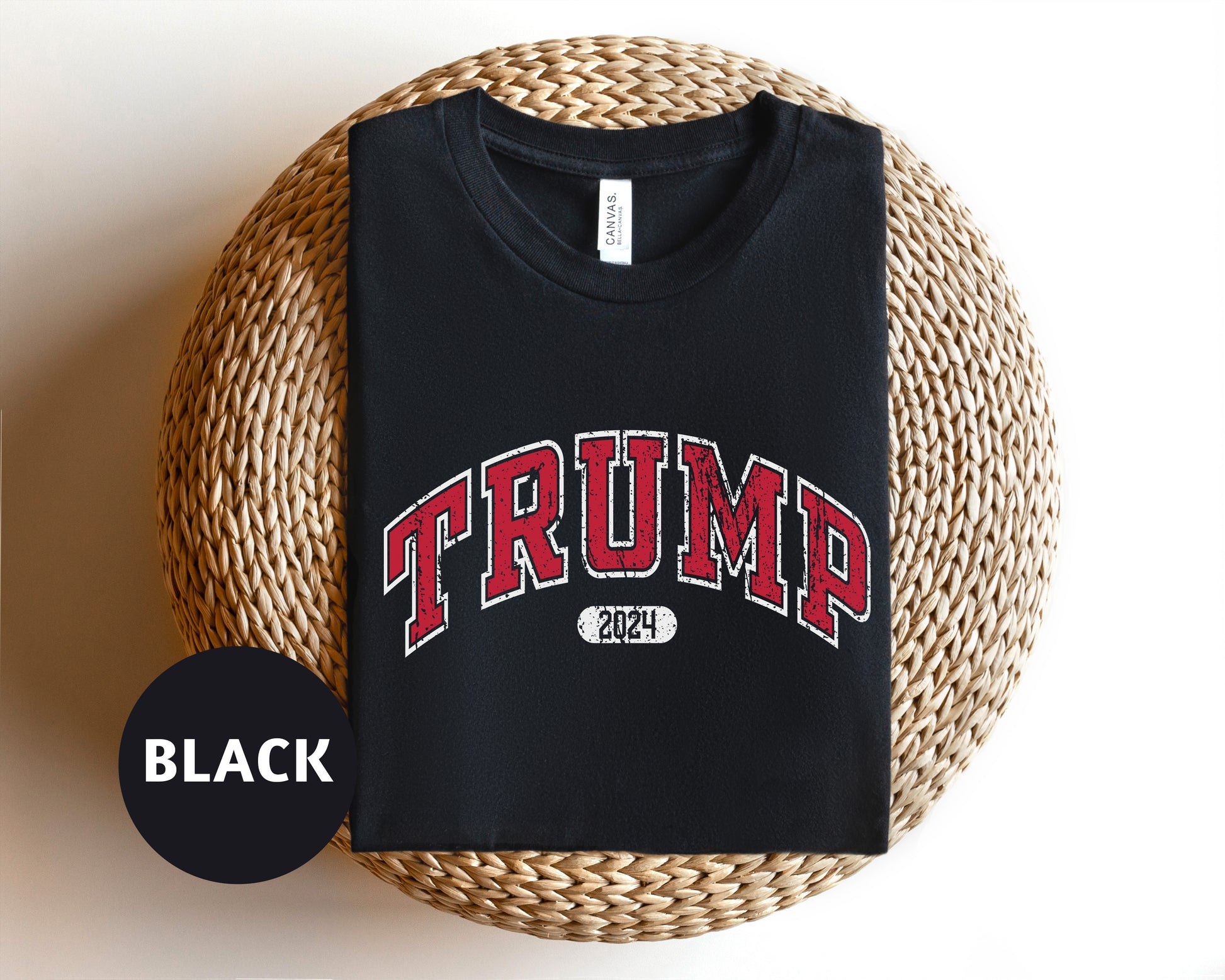 a black shirt with the word trump on it