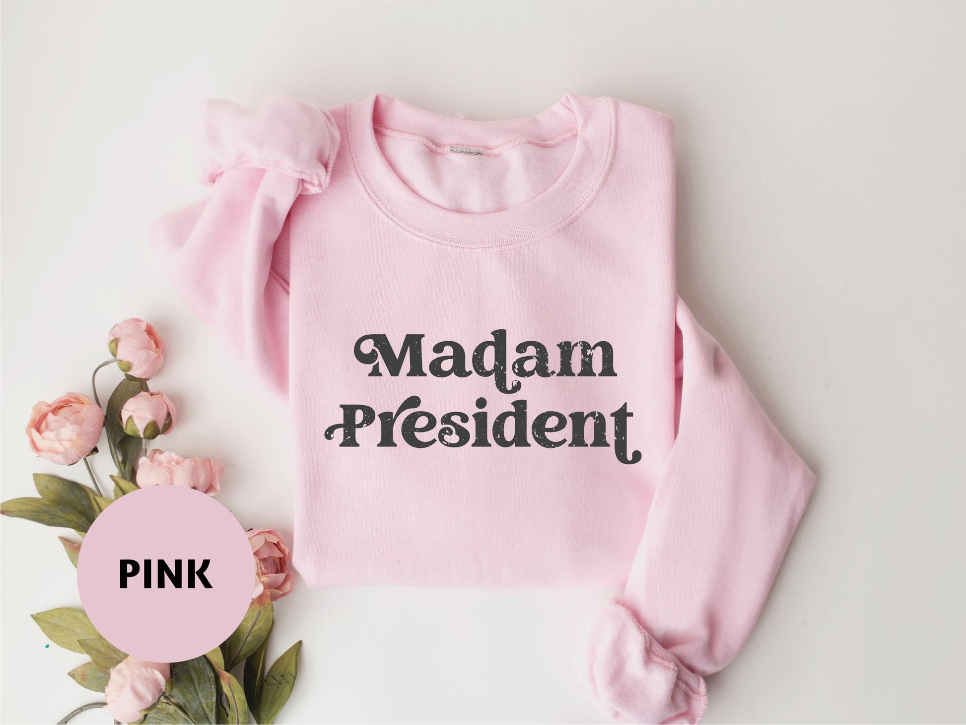 a pink sweatshirt with the words madam president on it
