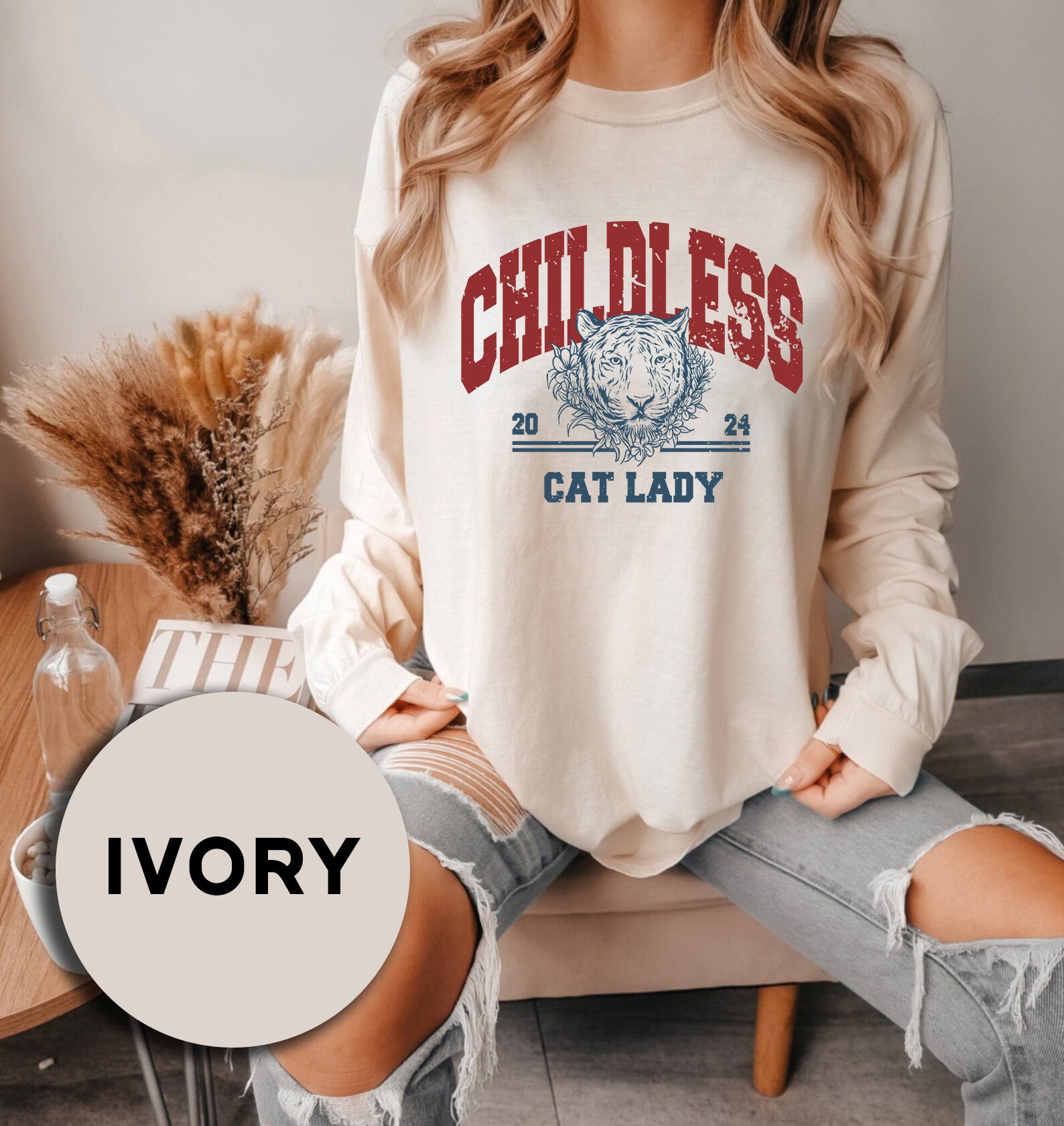 a woman sitting on a couch with her legs crossed