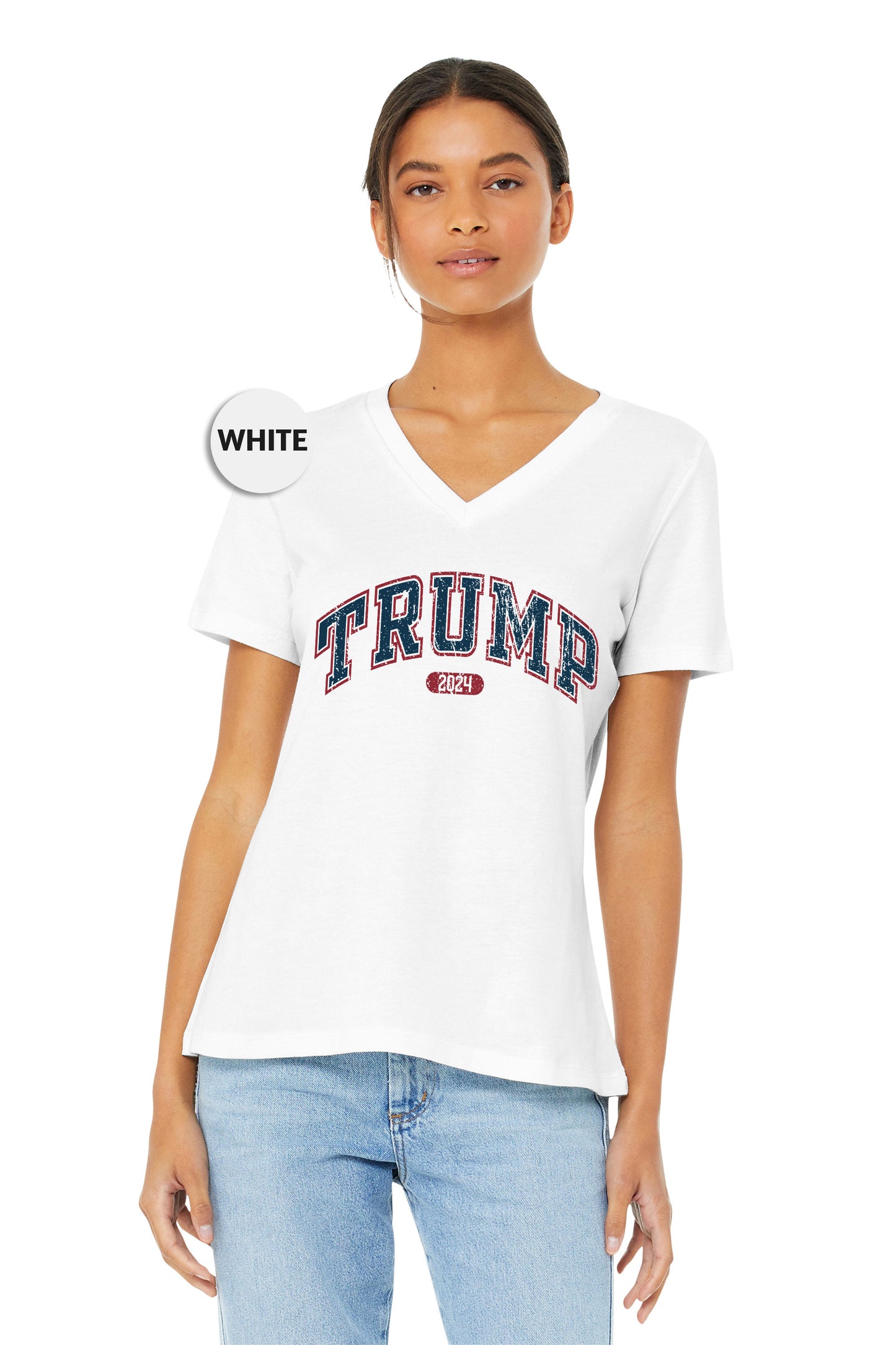 a woman wearing a white shirt with the word trump on it