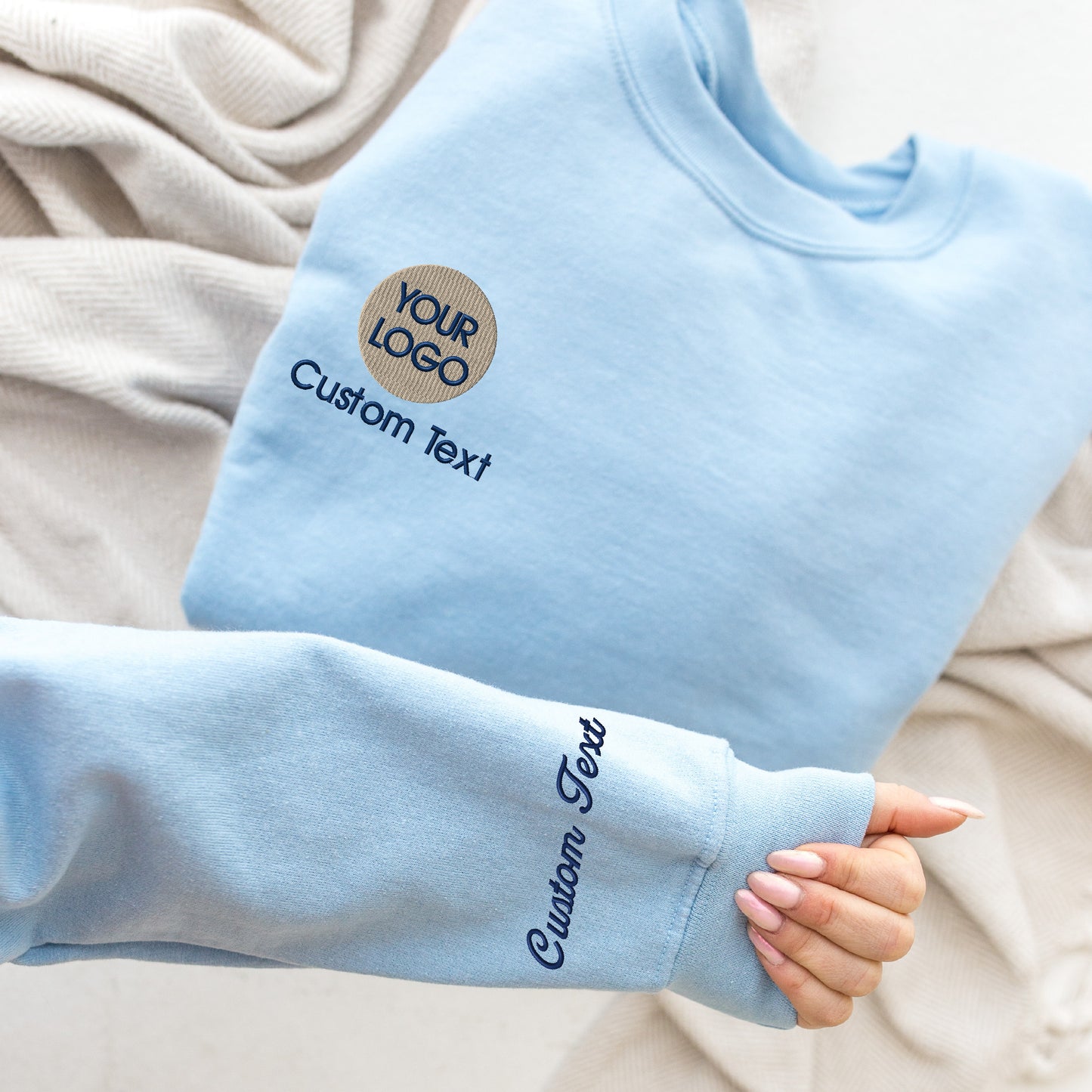 a person's arm with a blue shirt on it