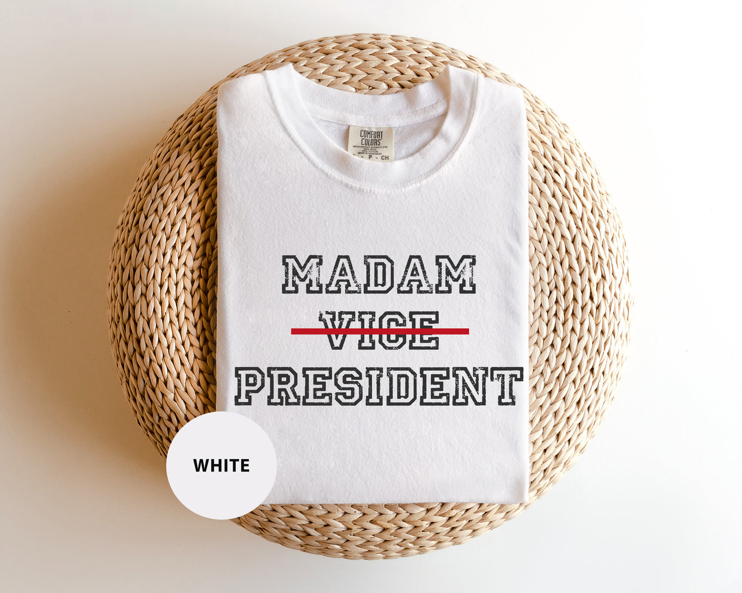 a white t - shirt with the words madam who president printed on it