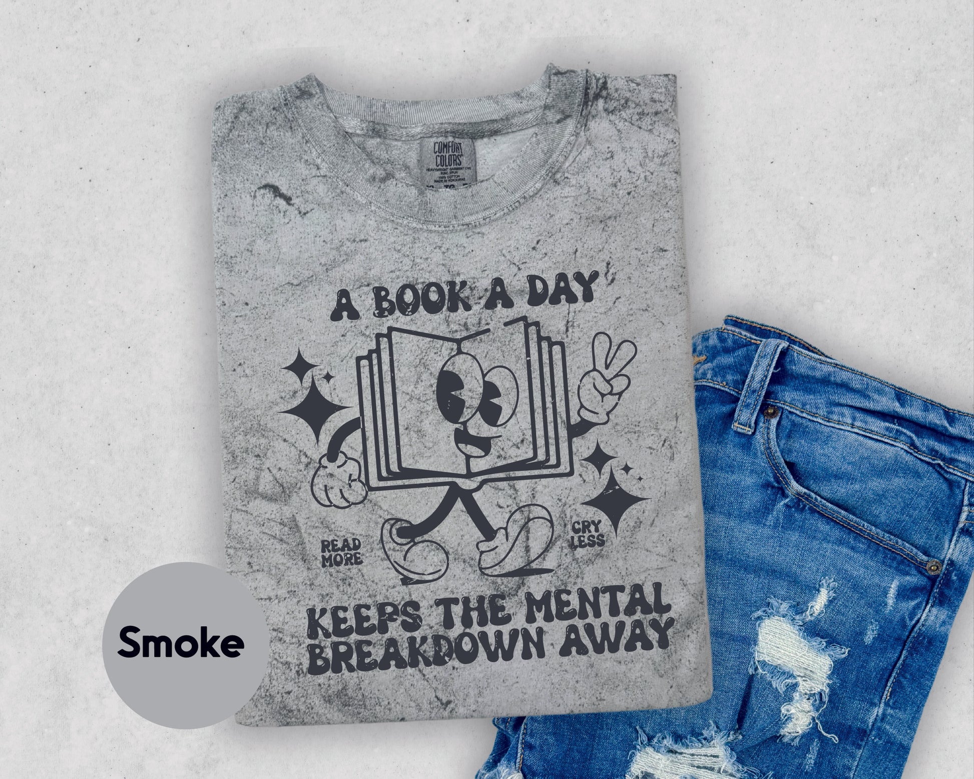 a t - shirt that reads a book a day keep the mental breakdown away