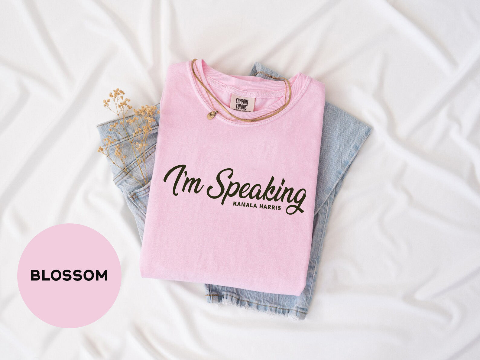 a pink shirt that says i'm speaking on it