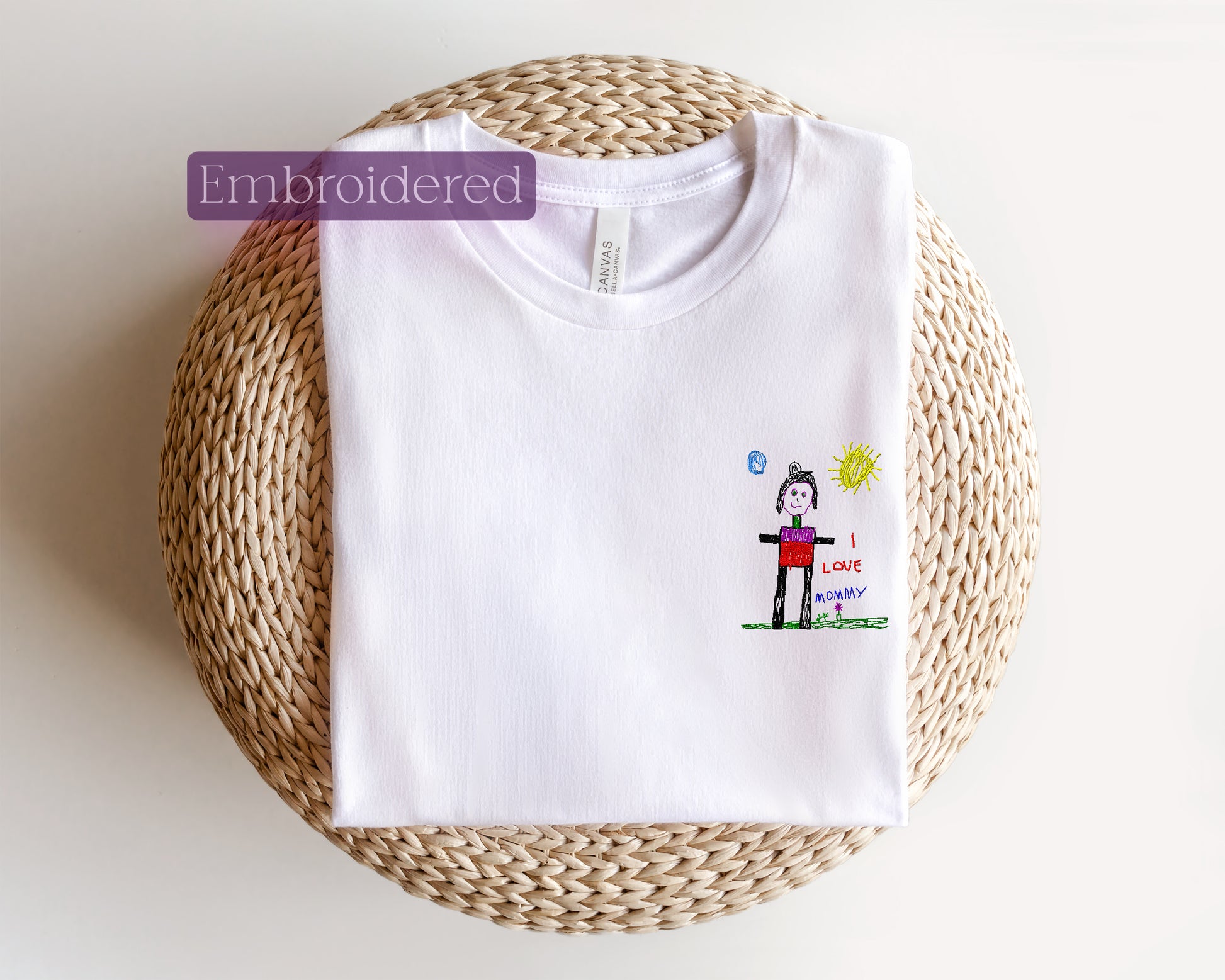 a white t - shirt with a picture of a person on it