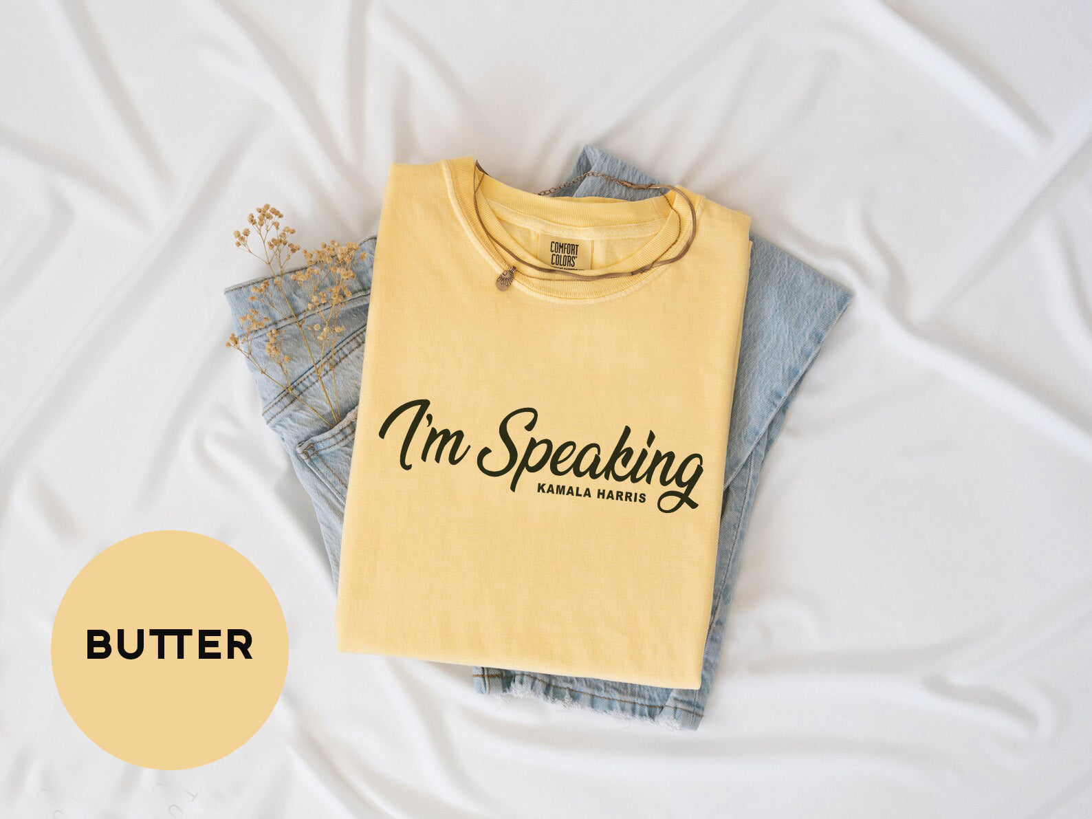 a t - shirt that says i'm speaking on it and a pair of