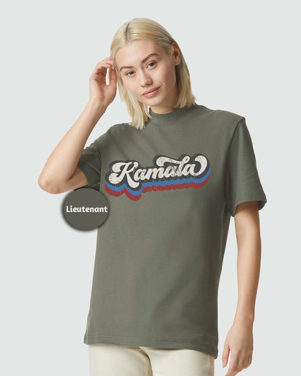 a woman wearing a khaki t - shirt and white pants