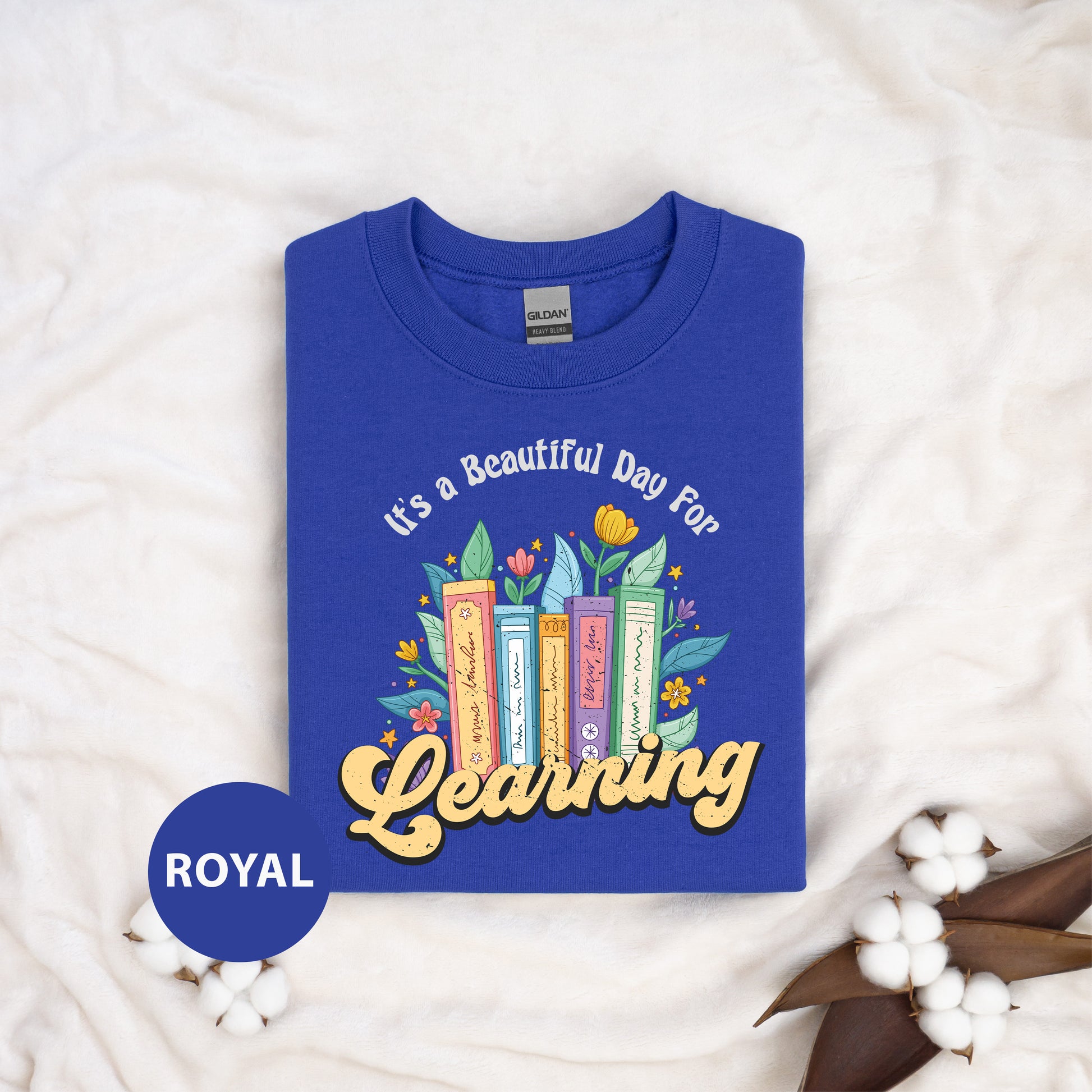 a blue t - shirt that says it's a beautiful day for learning