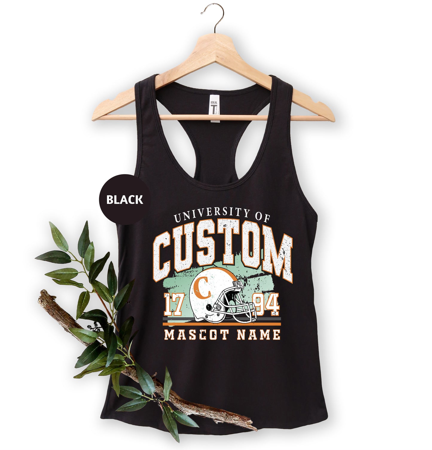 a black tank top with a football helmet on it