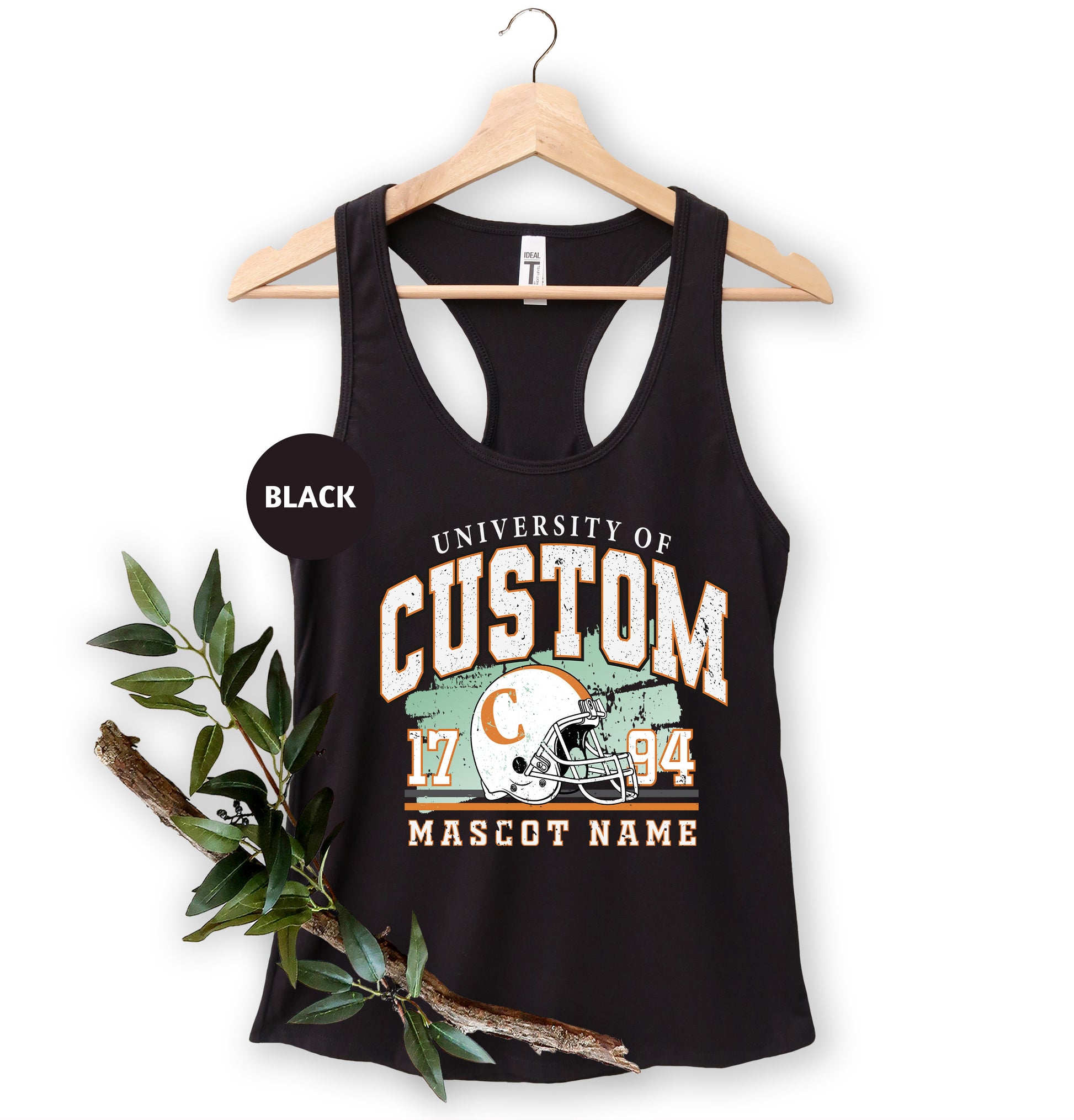 a black tank top with a football helmet on it