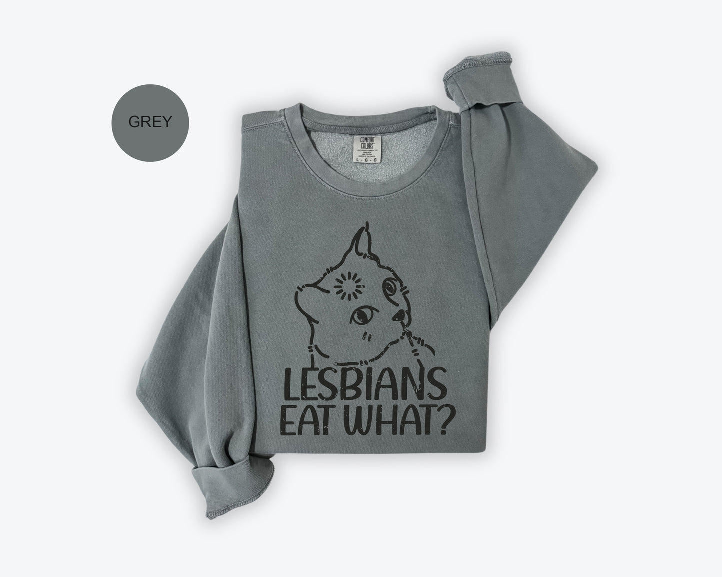 a grey shirt with a cat on it that says lesbians eat what?