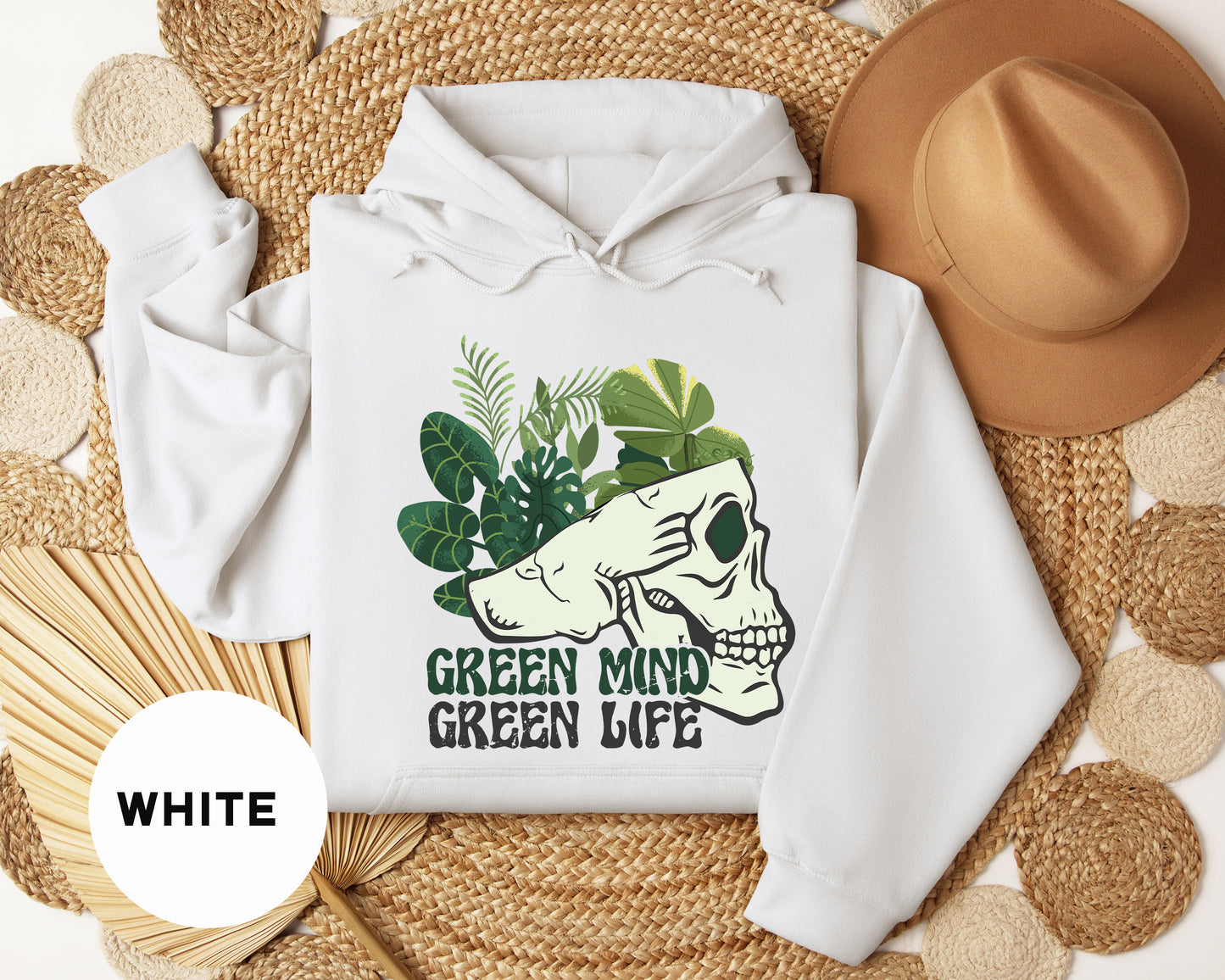 a white hoodie with a green mind on it
