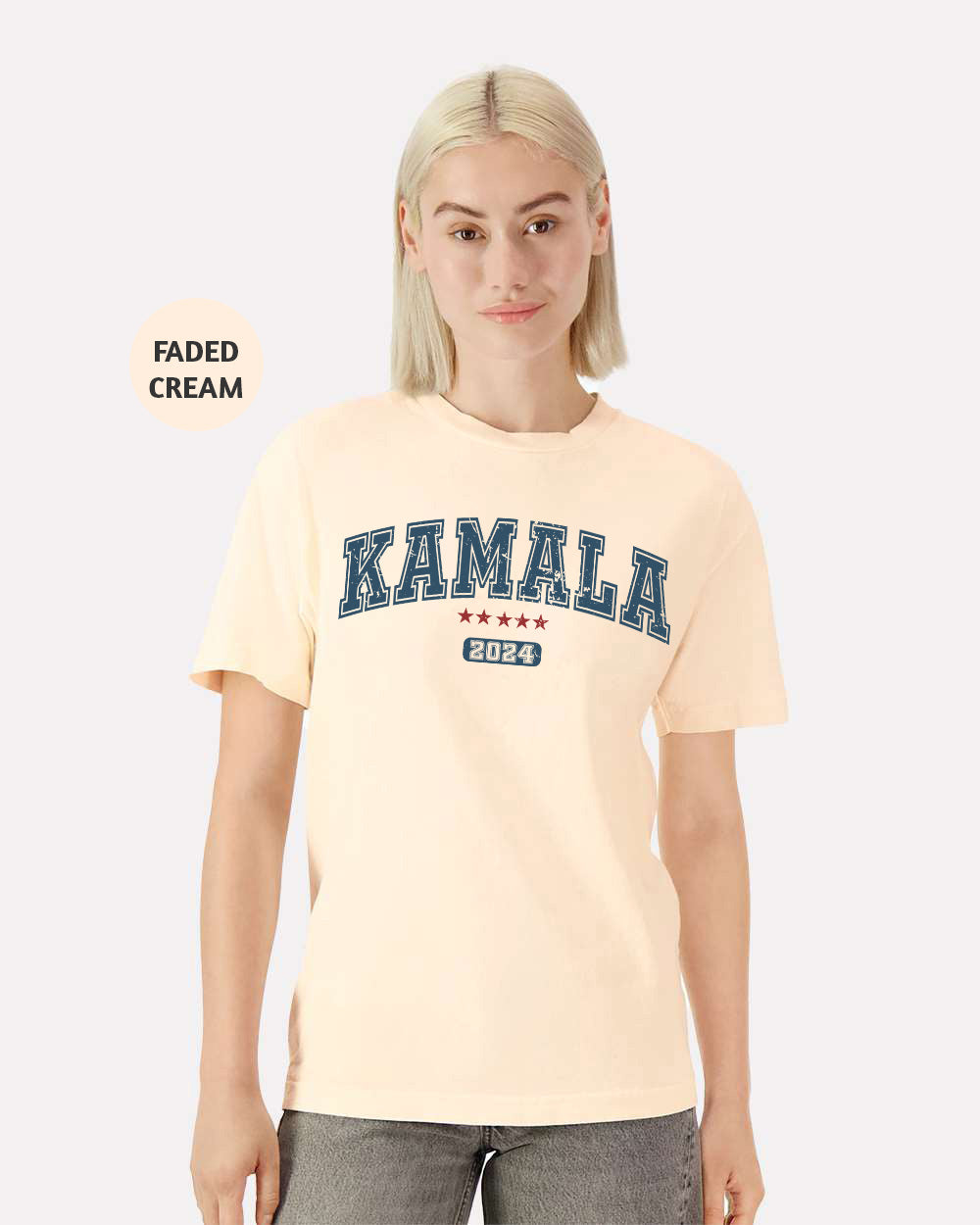 a woman with blonde hair wearing a cream shirt