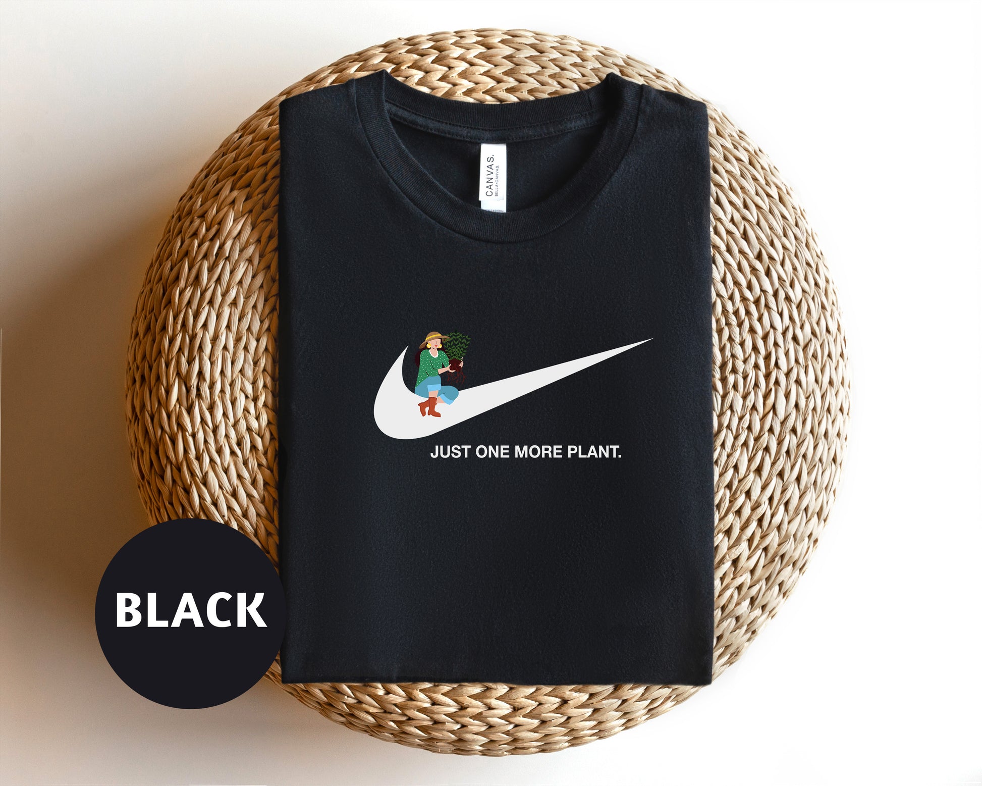 a black shirt with a white nike logo on it