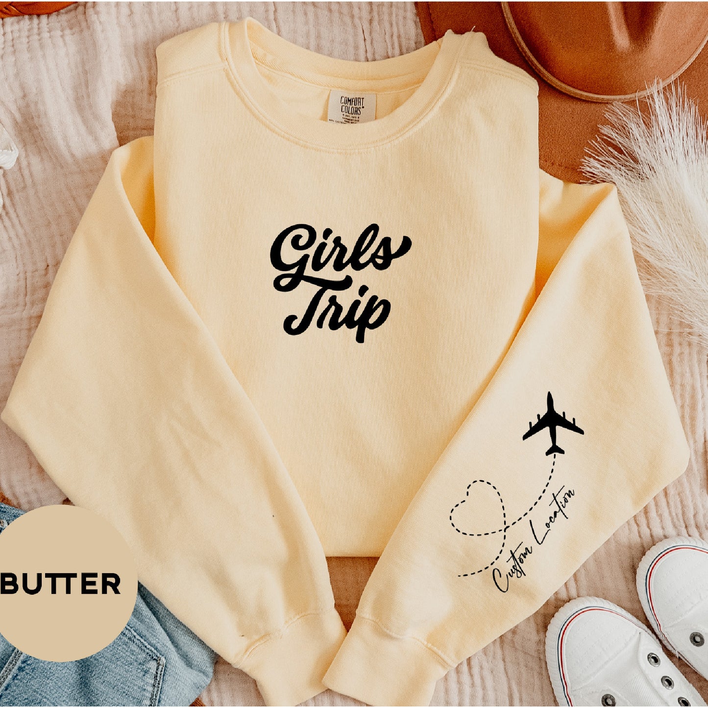 a yellow sweatshirt with the words girls trip written on it