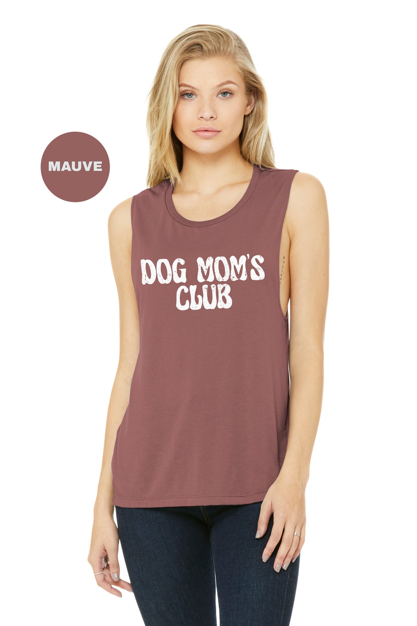 a woman wearing a tank top that says dog mom's club