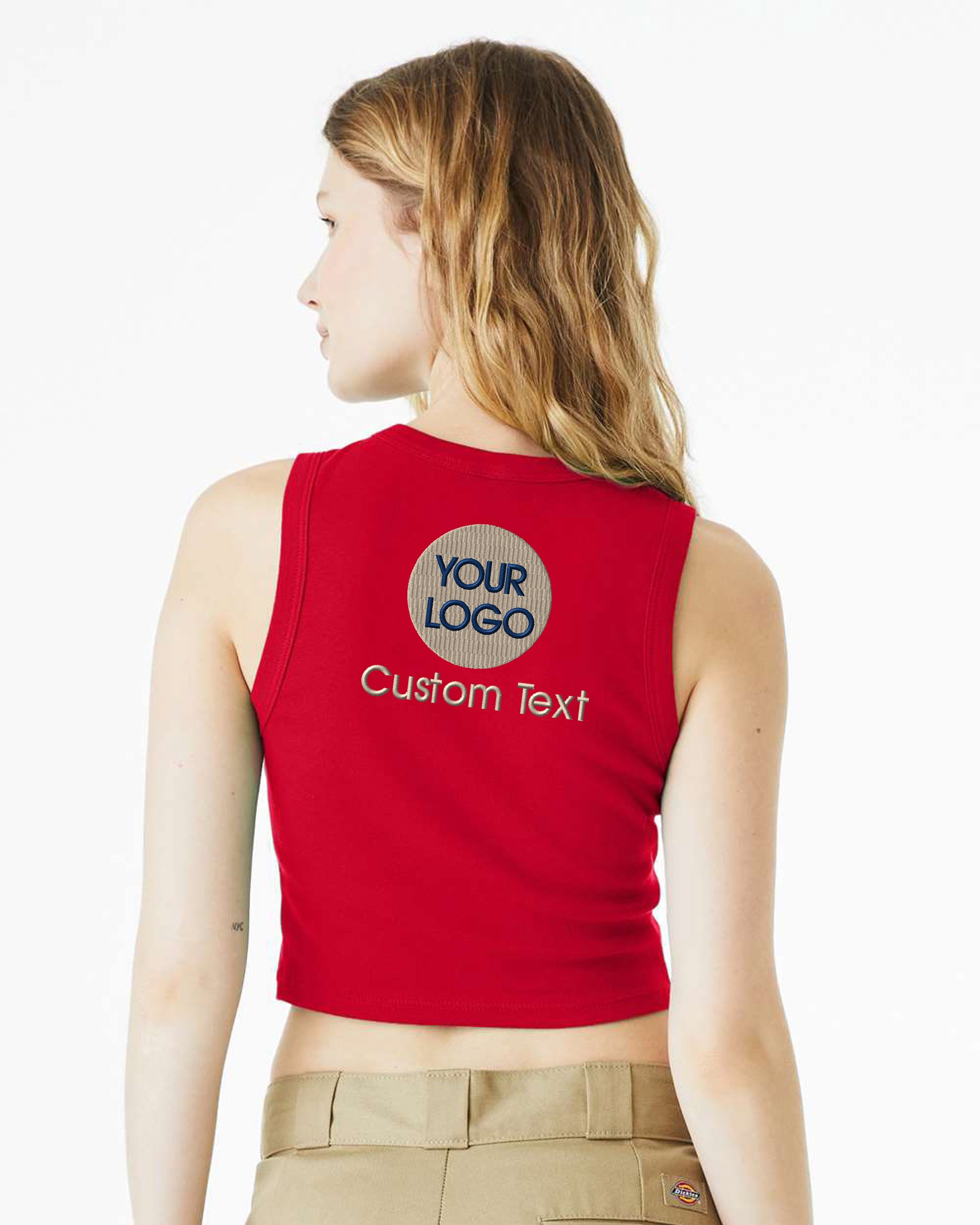 a woman wearing a red crop top with your logo on it