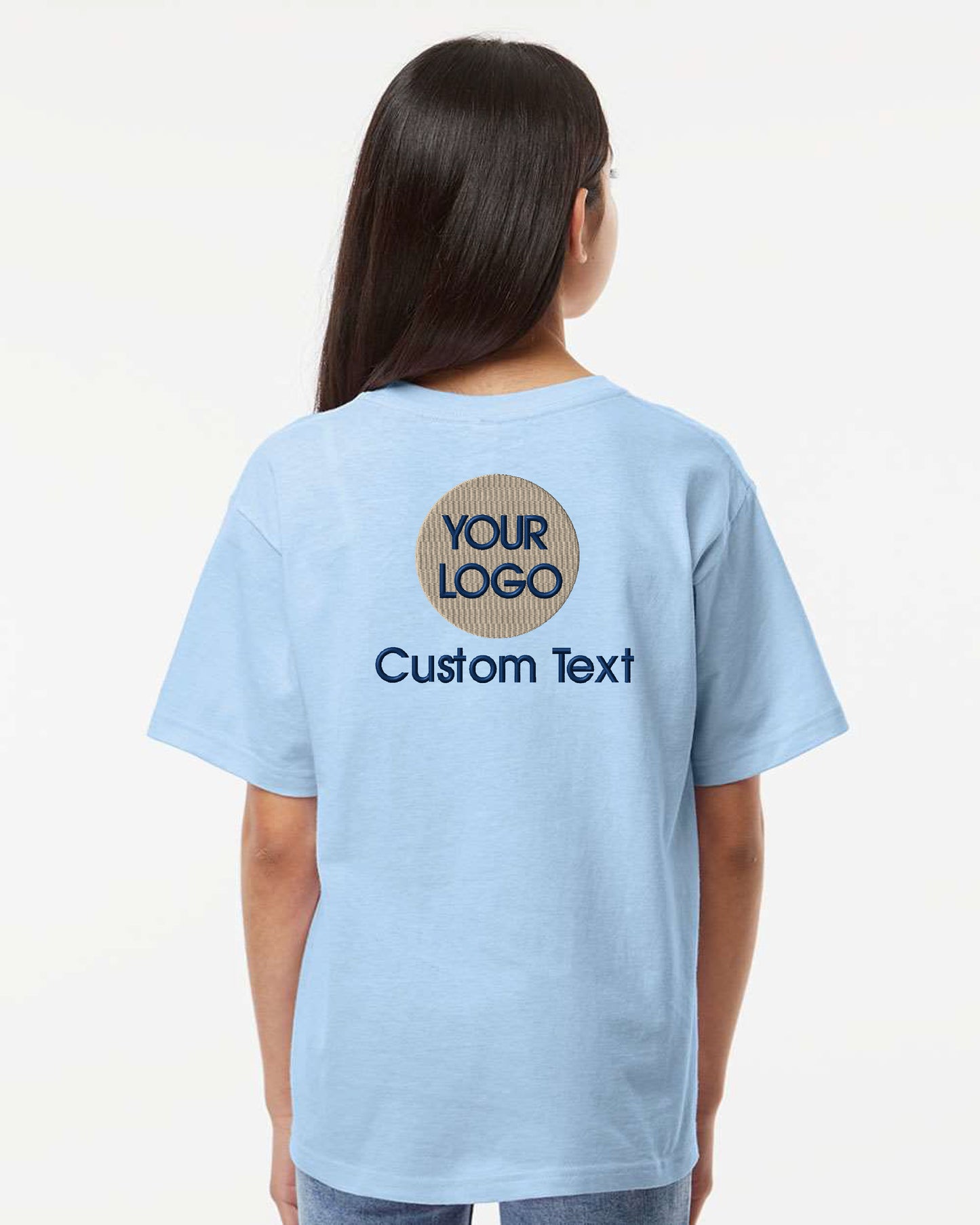 a young girl wearing a light blue t - shirt with your logo on it