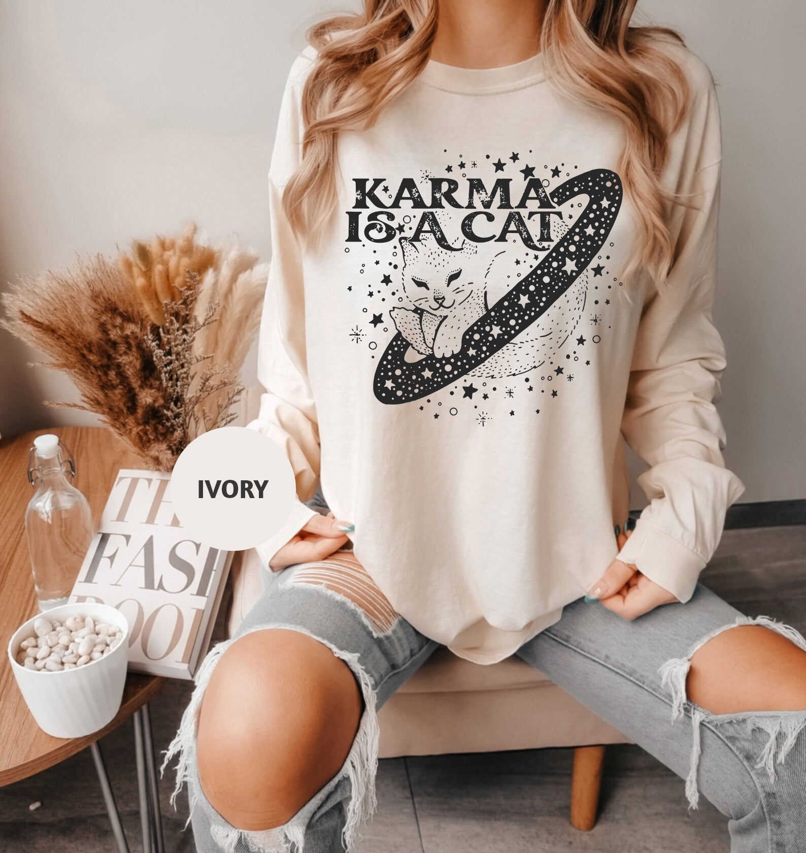 a woman sitting on a chair with her legs crossed