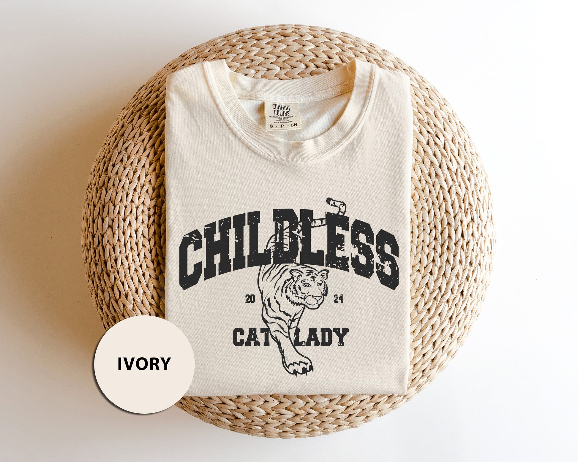 a white shirt with a black and white logo on it