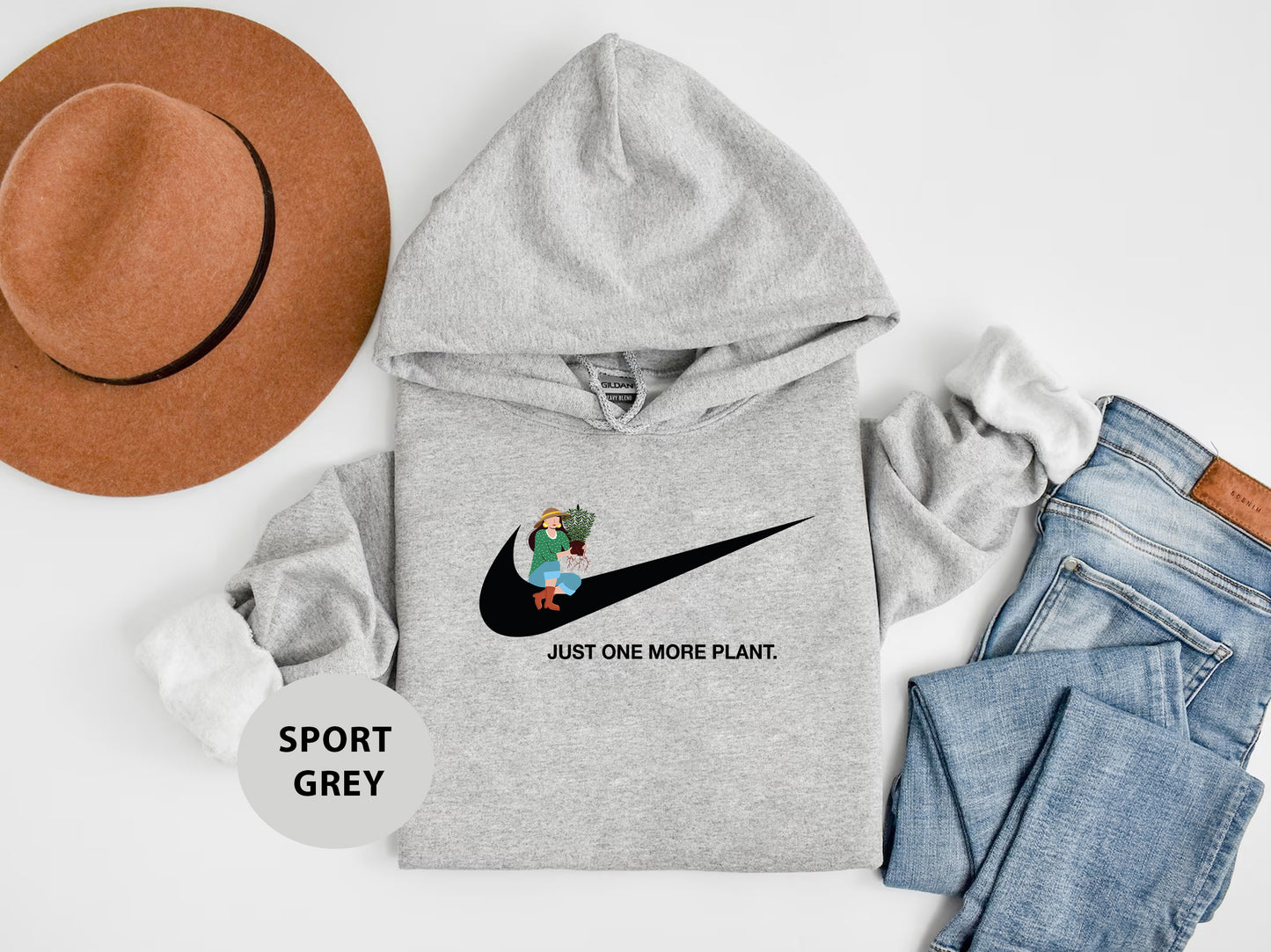 a hoodie with a hat, jeans, and a pair of shoes