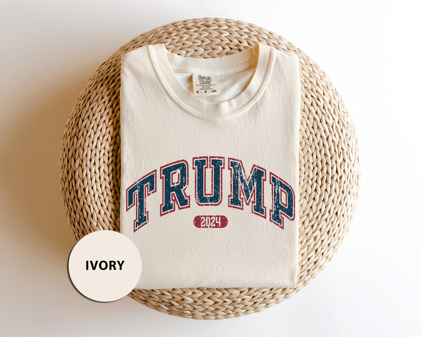 a white shirt with the word trump printed on it