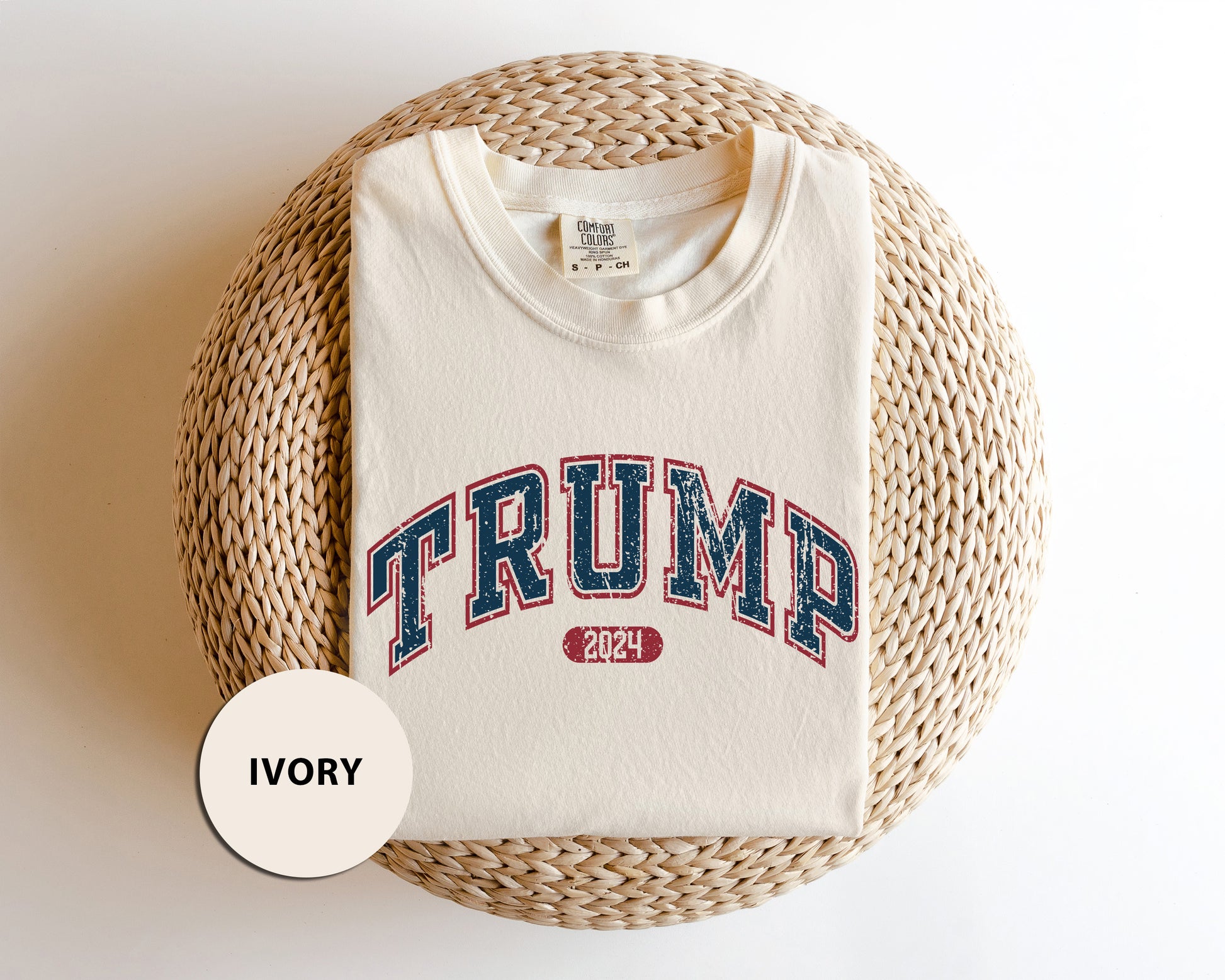 a white shirt with the word trump printed on it