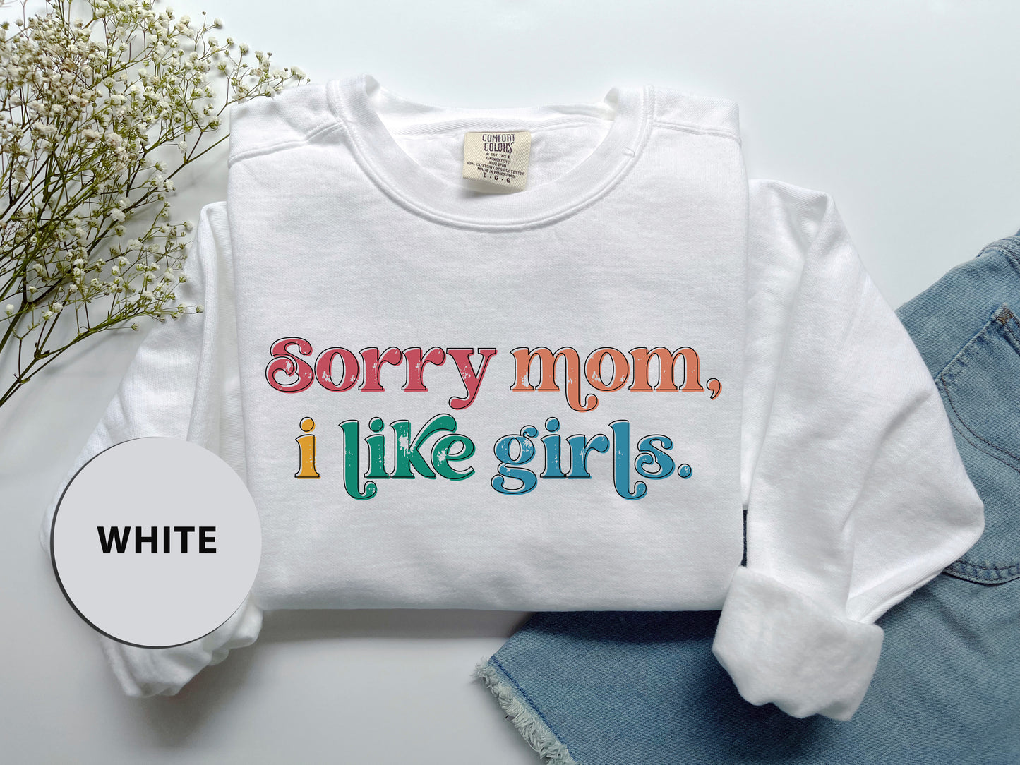 a white shirt that says sorry mom i like girls