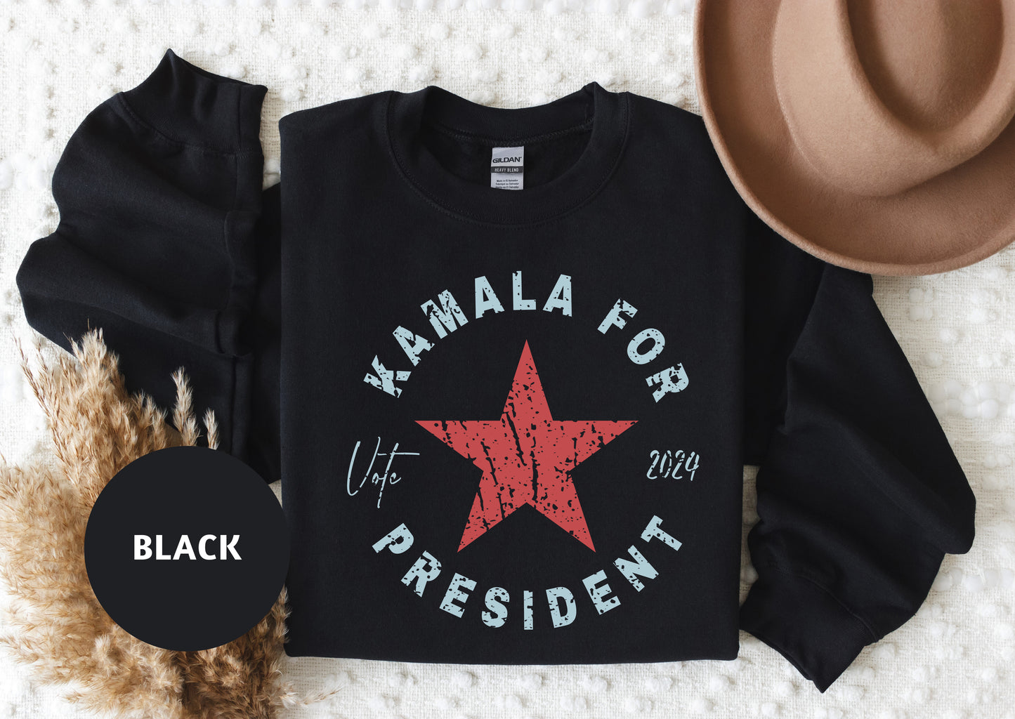 a black shirt with a red star on it