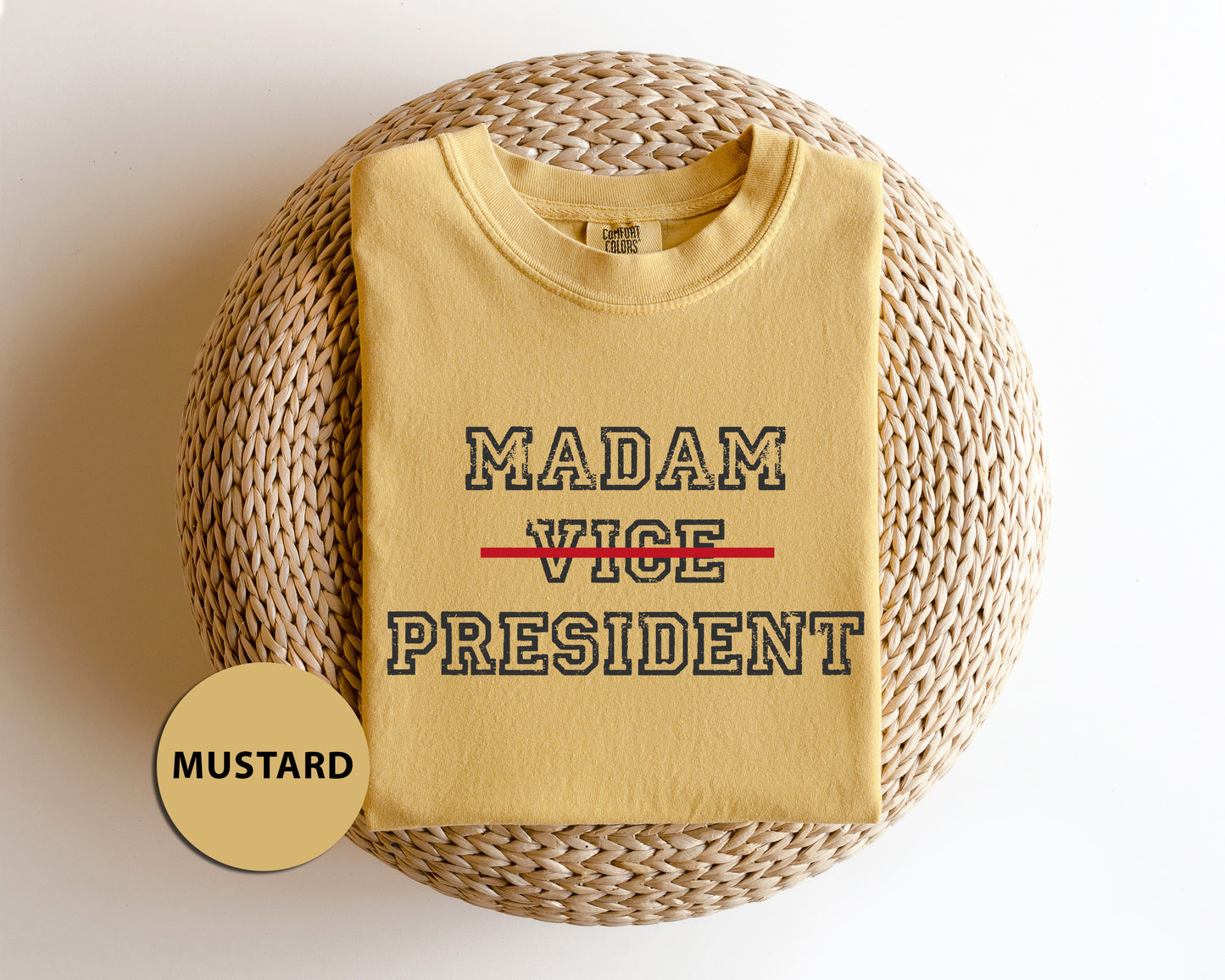 a yellow shirt that says madam vice president