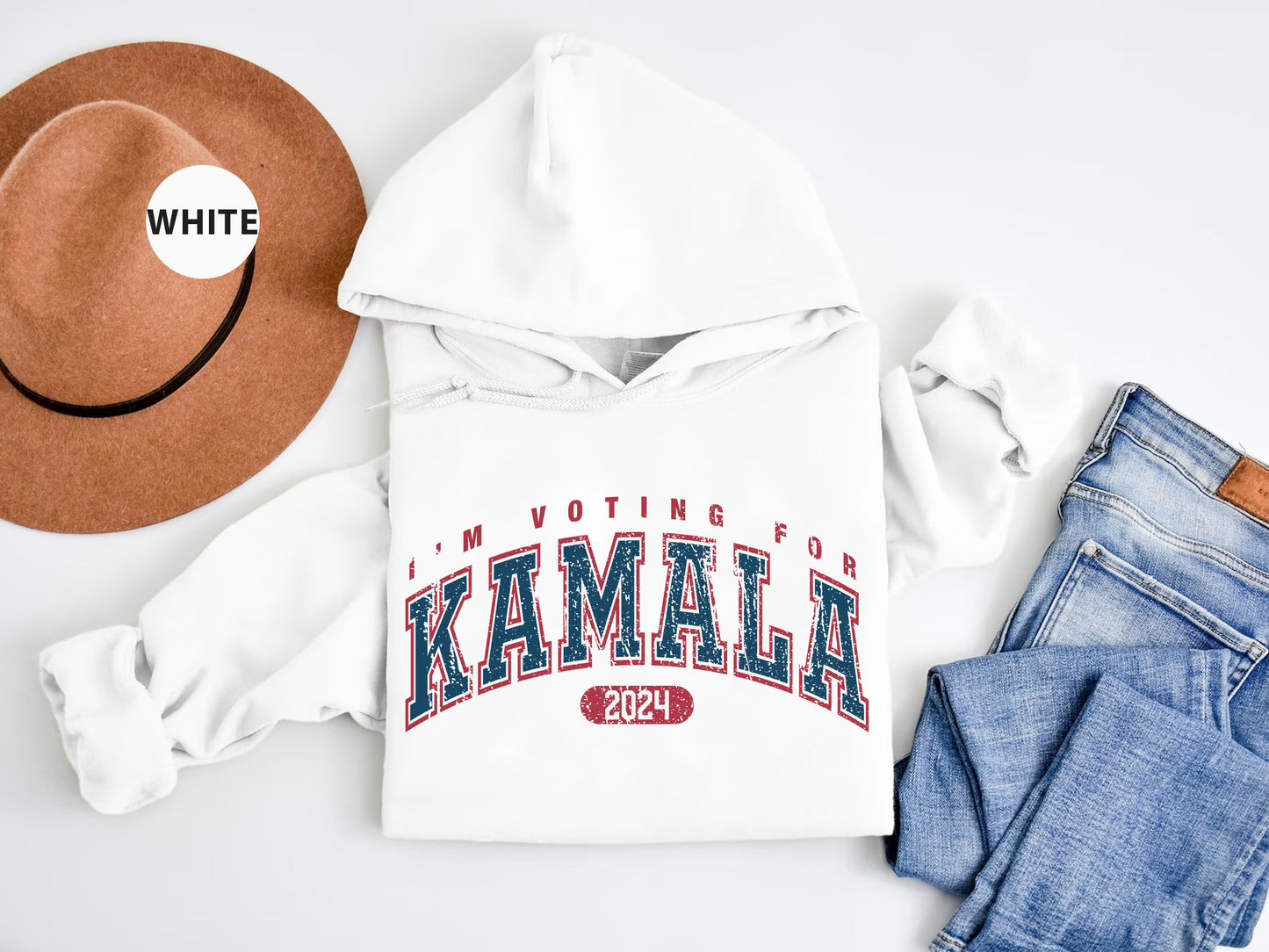 a white hoodie with a hat and jeans